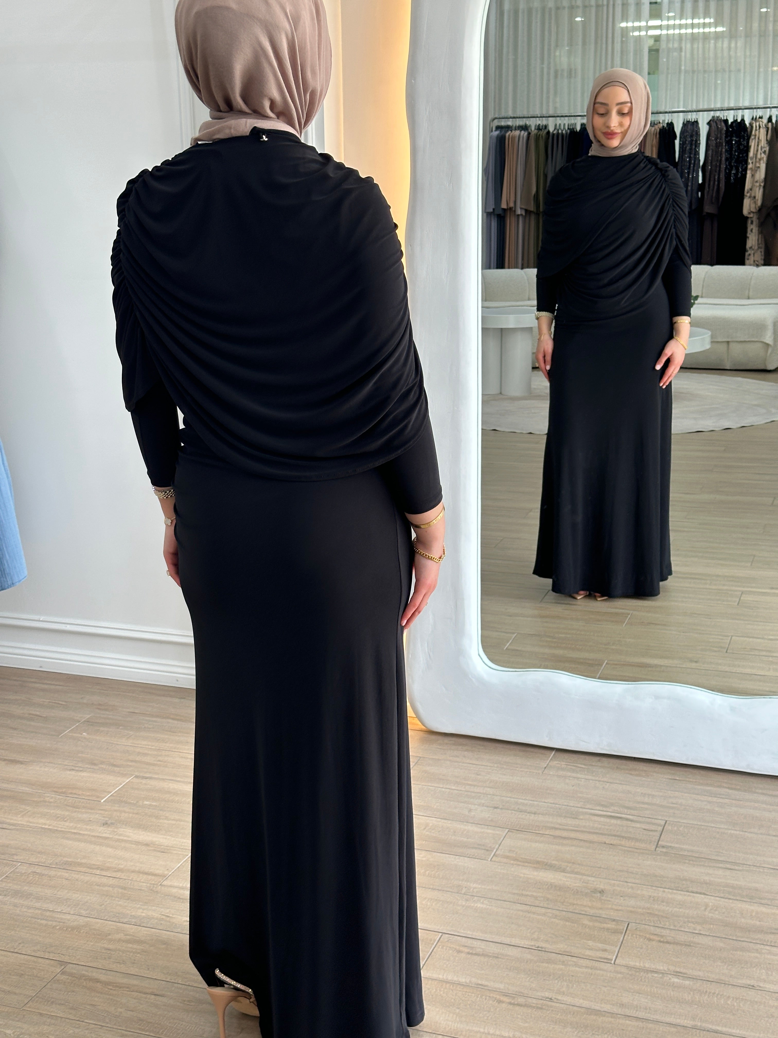 women's full length maxi formal dress in black, jersey fabrication with drape and ruching for parties, occasions, events, engagements, weddings. modest and lightweight with long sleeves.
