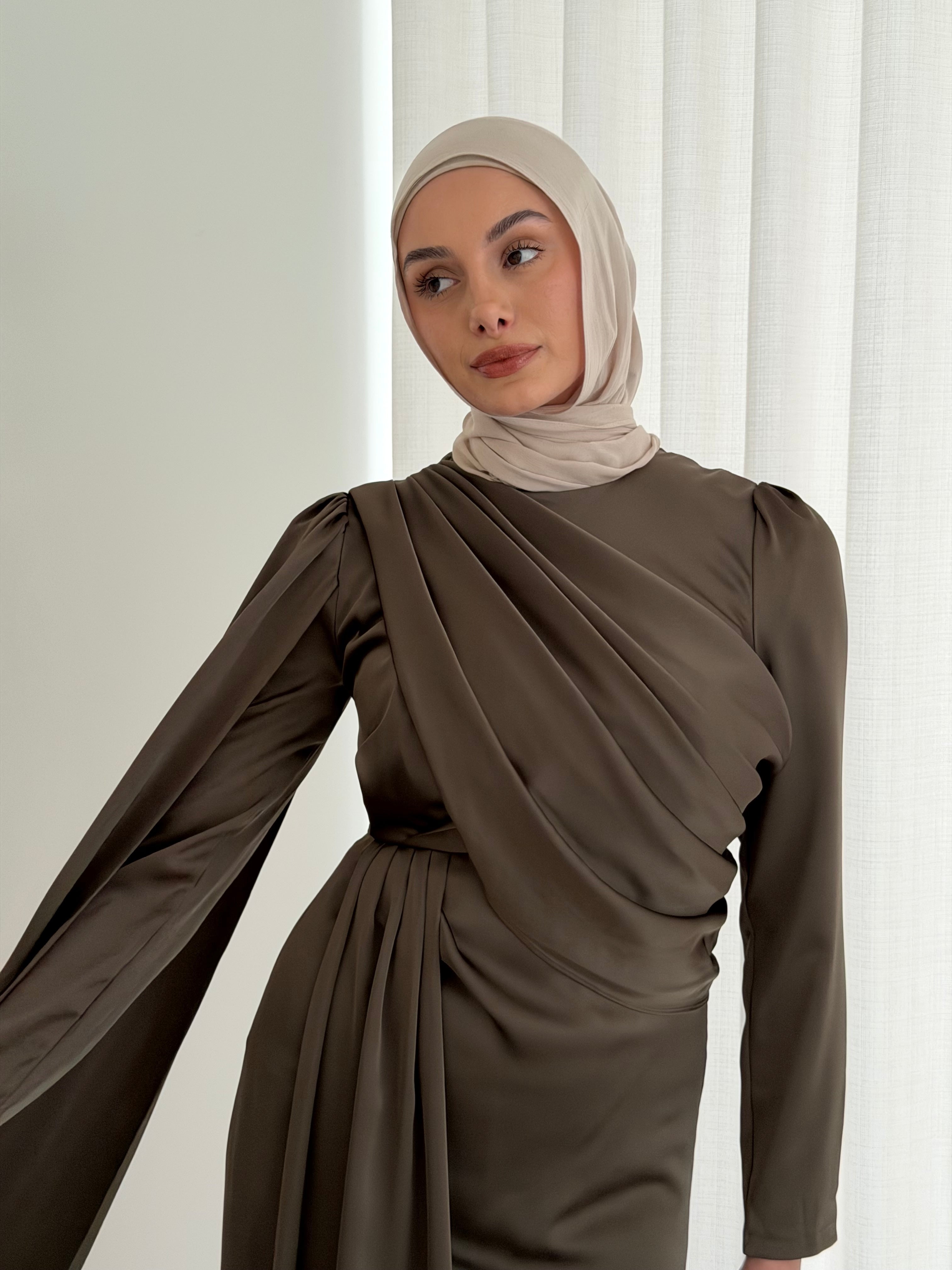 women's full length formal dress in satin, maxi with long sleeves. soft satin drape in lightweight fabrication for spring summer day or night event. hijabi friendly, modest and full coverage for prom, formals, engagements, kk, nikkah, fatiha, wedding guest.