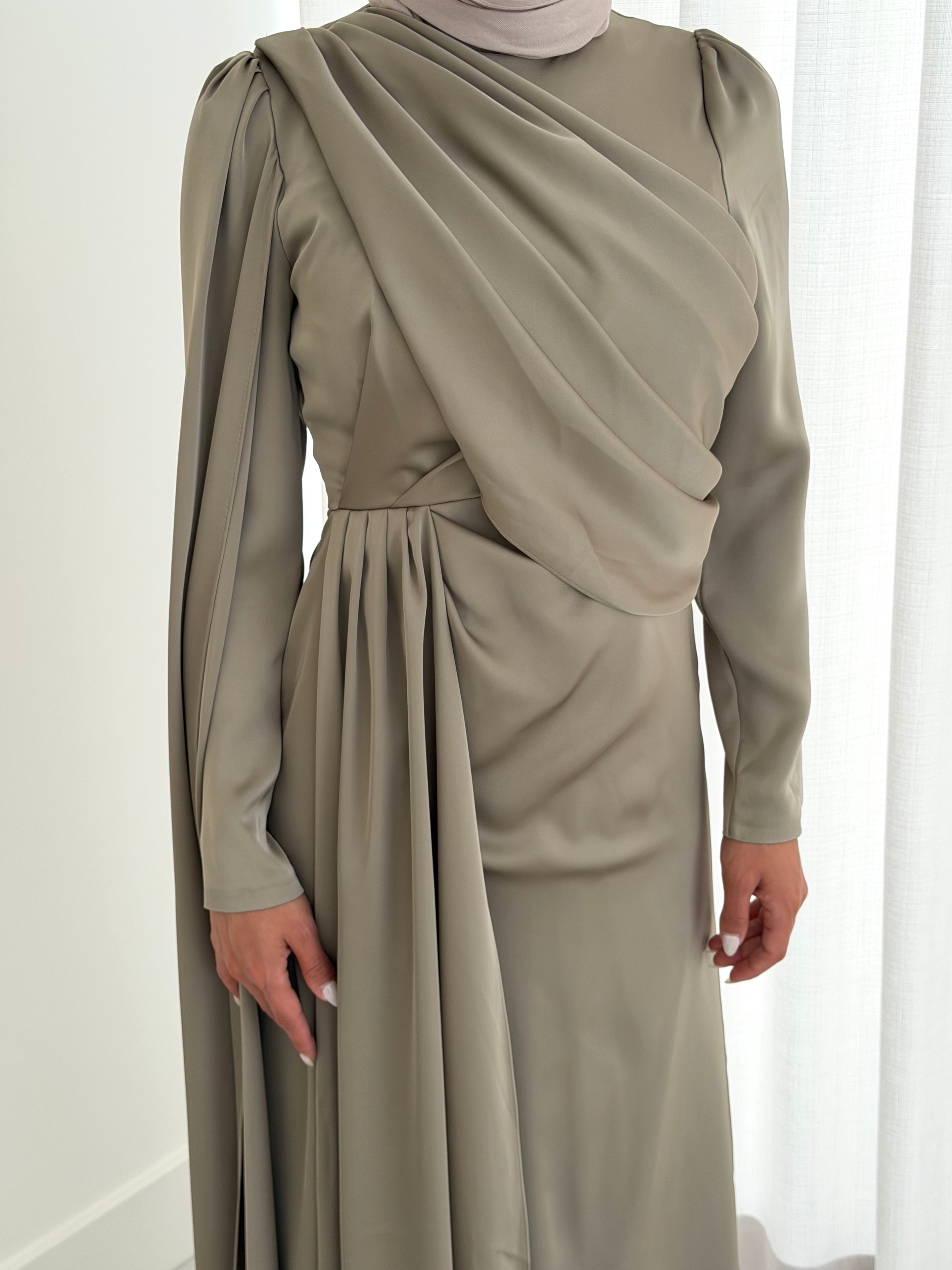 women's full length formal dress in satin, maxi with long sleeves. soft satin drape in lightweight fabrication for spring summer day or night event. hijabi friendly, modest and full coverage for prom, formals, engagements, kk, nikkah, fatiha, wedding guest.