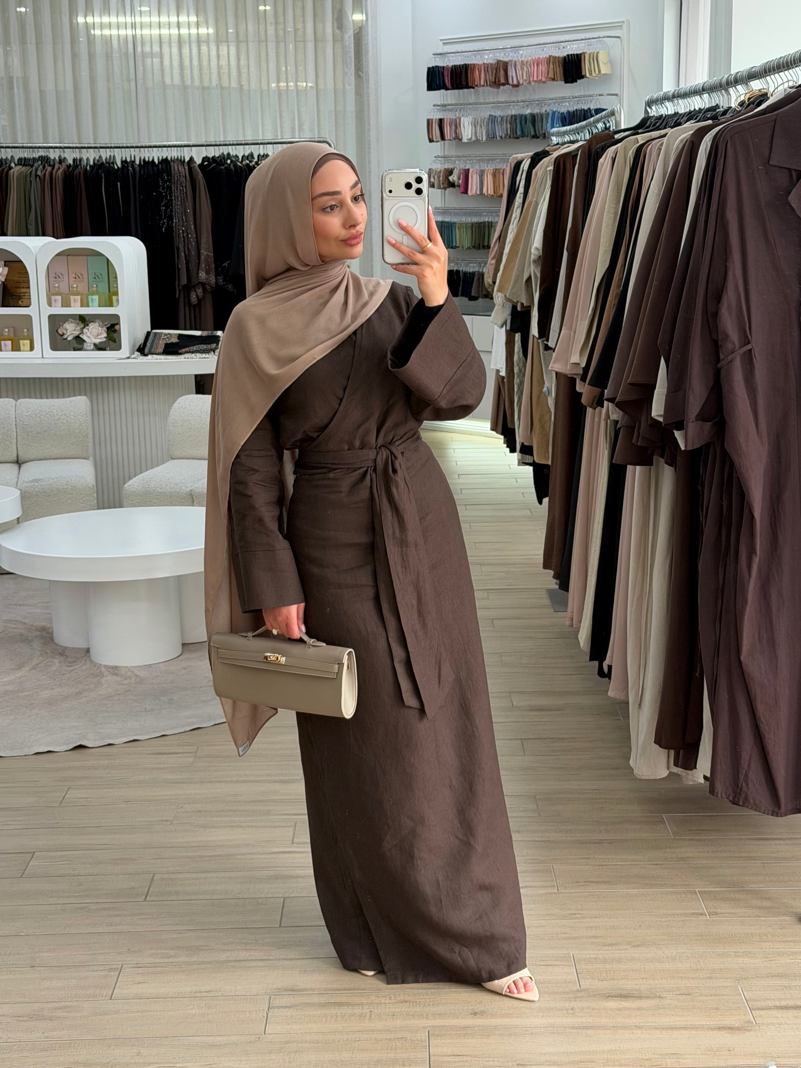 model wearing linen wrap tie dress with scarf in neutral shades