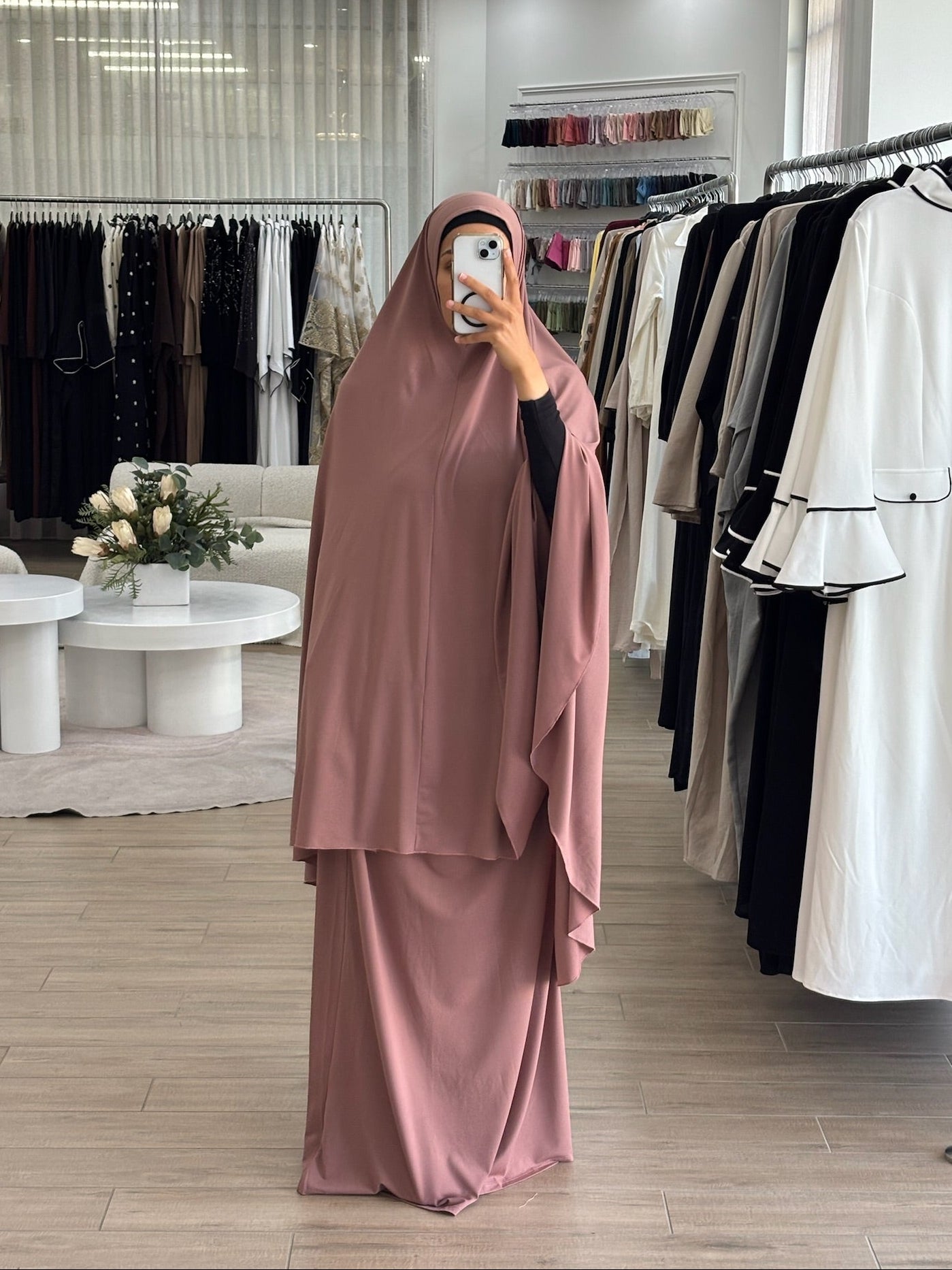 Model wearing a prayer set with a loose, flowing silhouette, designed for comfortable and modest prayer wear.