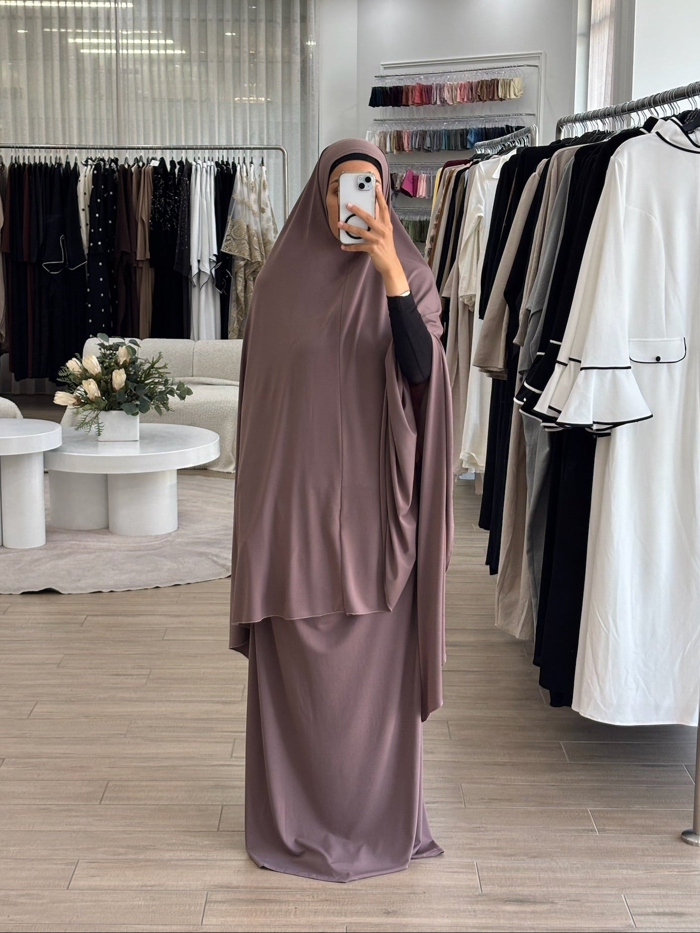 Model wearing a prayer set with a loose, flowing silhouette, designed for comfortable and modest prayer wear.