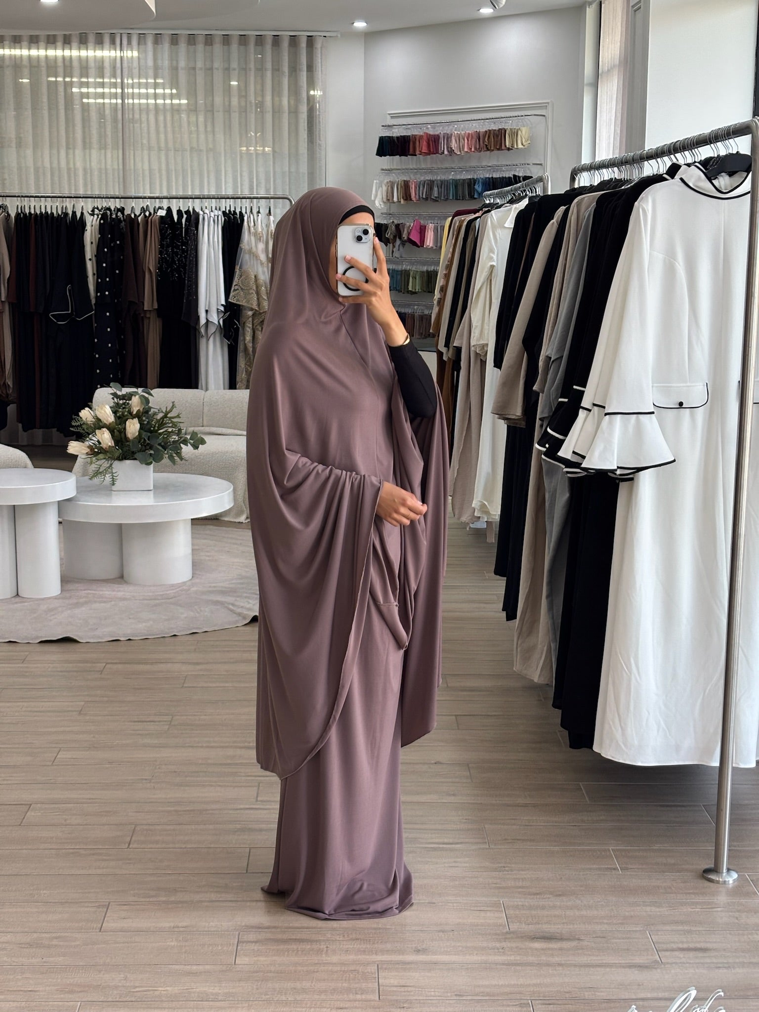 Model wearing a prayer set with a loose, flowing silhouette, designed for comfortable and modest prayer wear.
