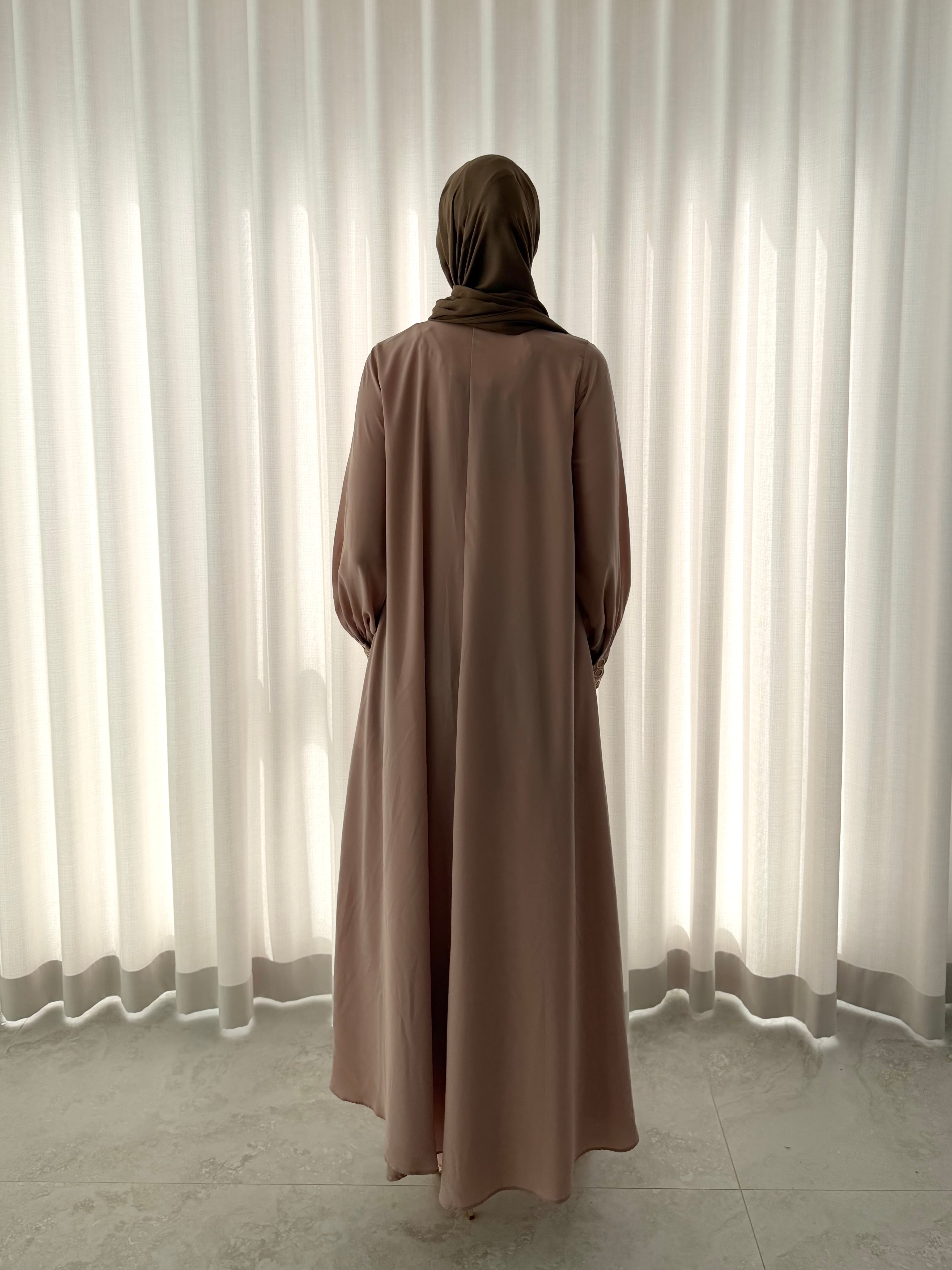 qamar abaya in blush- modest and flowy silhouette, back view