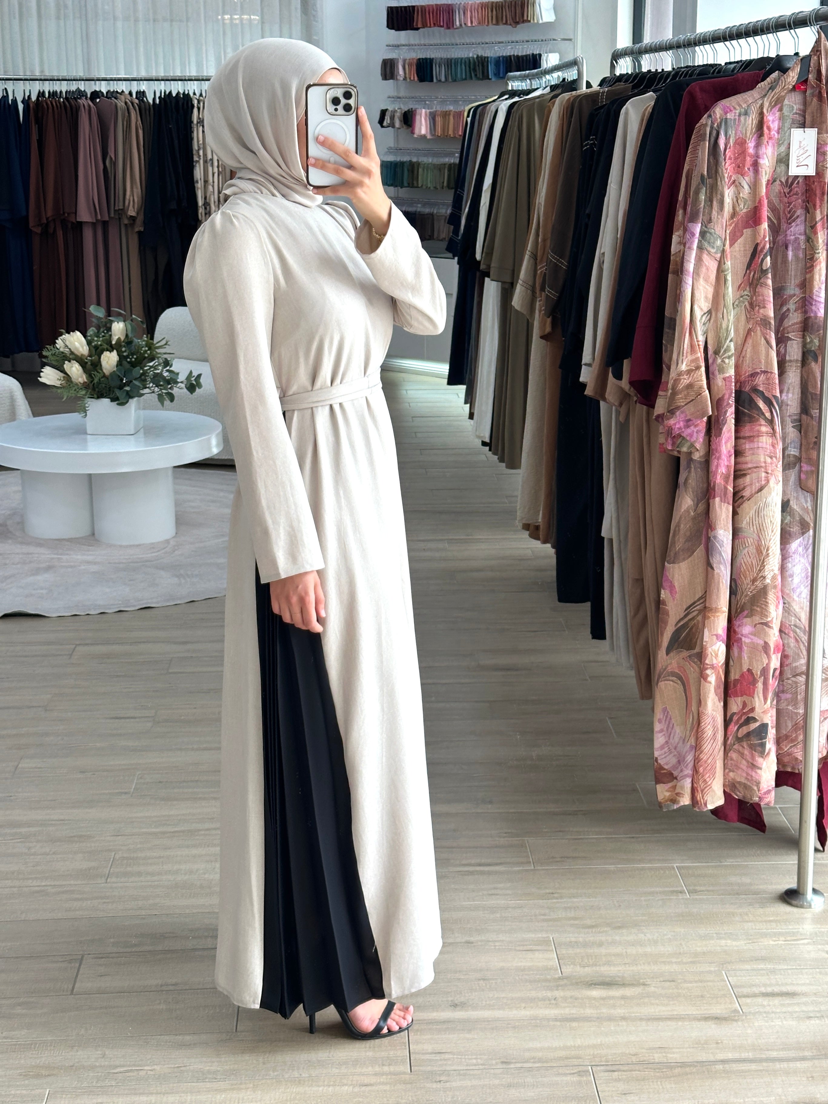 women's full length maxi dress with long sleeves and side pleats for day to night wear. lightweight and modest.