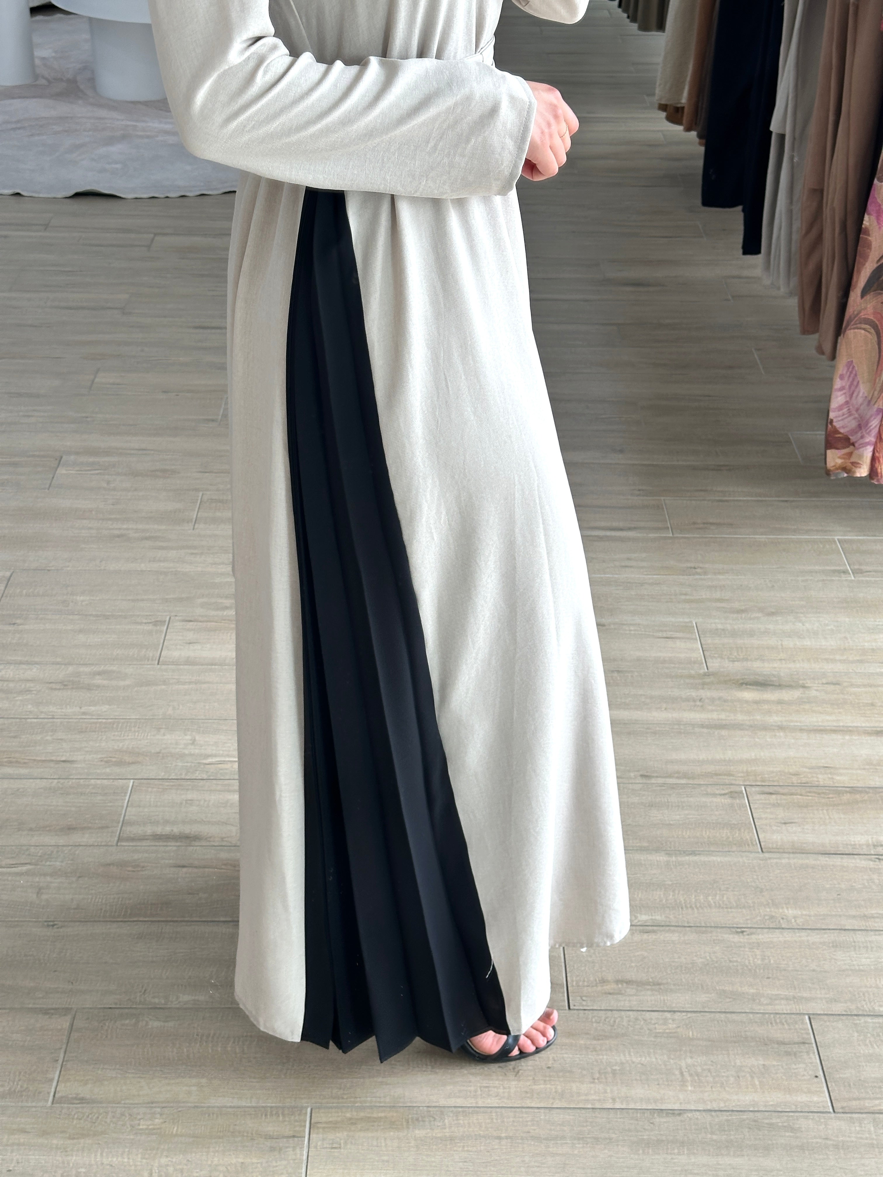 women's full length maxi dress with long sleeves and side pleats for day to night wear. lightweight and modest.