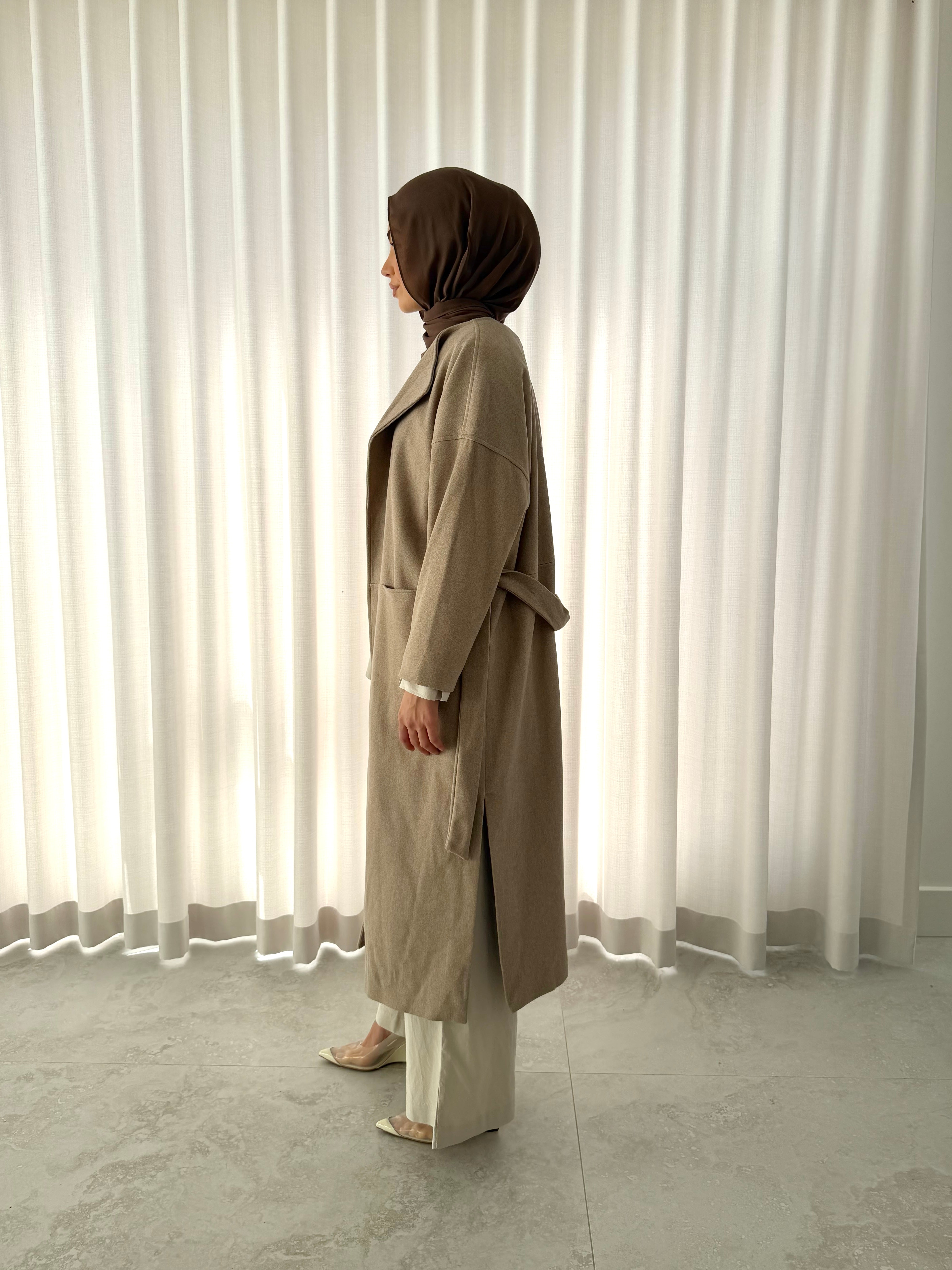 Refined Wrap Coat in sand – elegant wrap coat with feminine silhouette, side view
