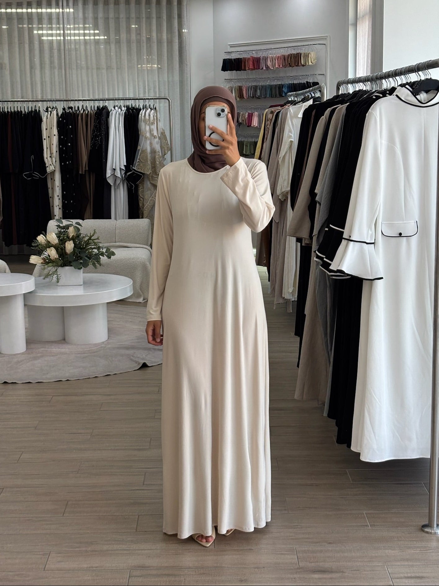 Model wearing the Staple Lycra dress featuring a smooth, streamlined silhouette in stretch lycra fabric, styled for everyday modest wear.