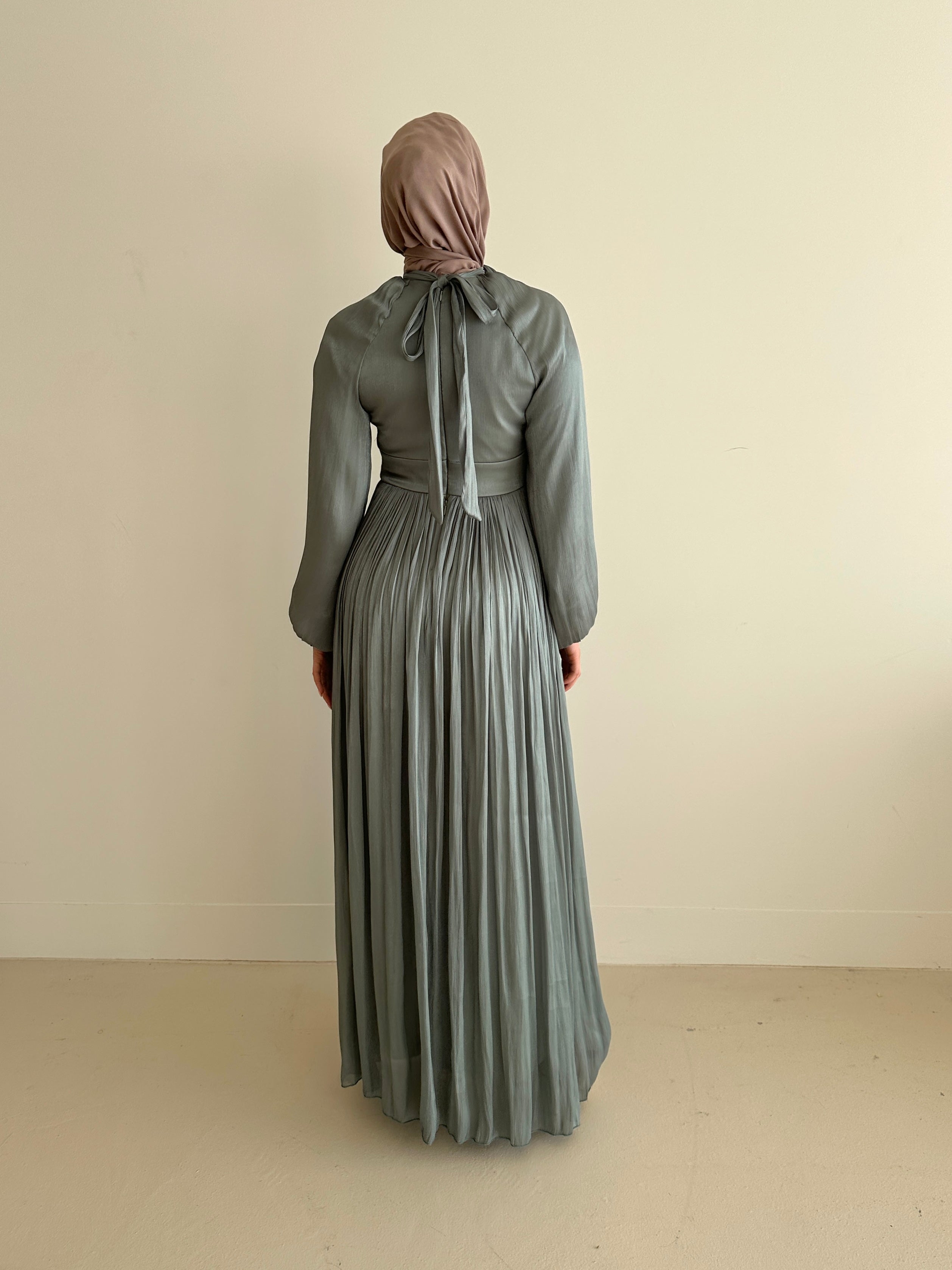 women's formal dress in green, modest, maxi, long-sleeve with full coverage.