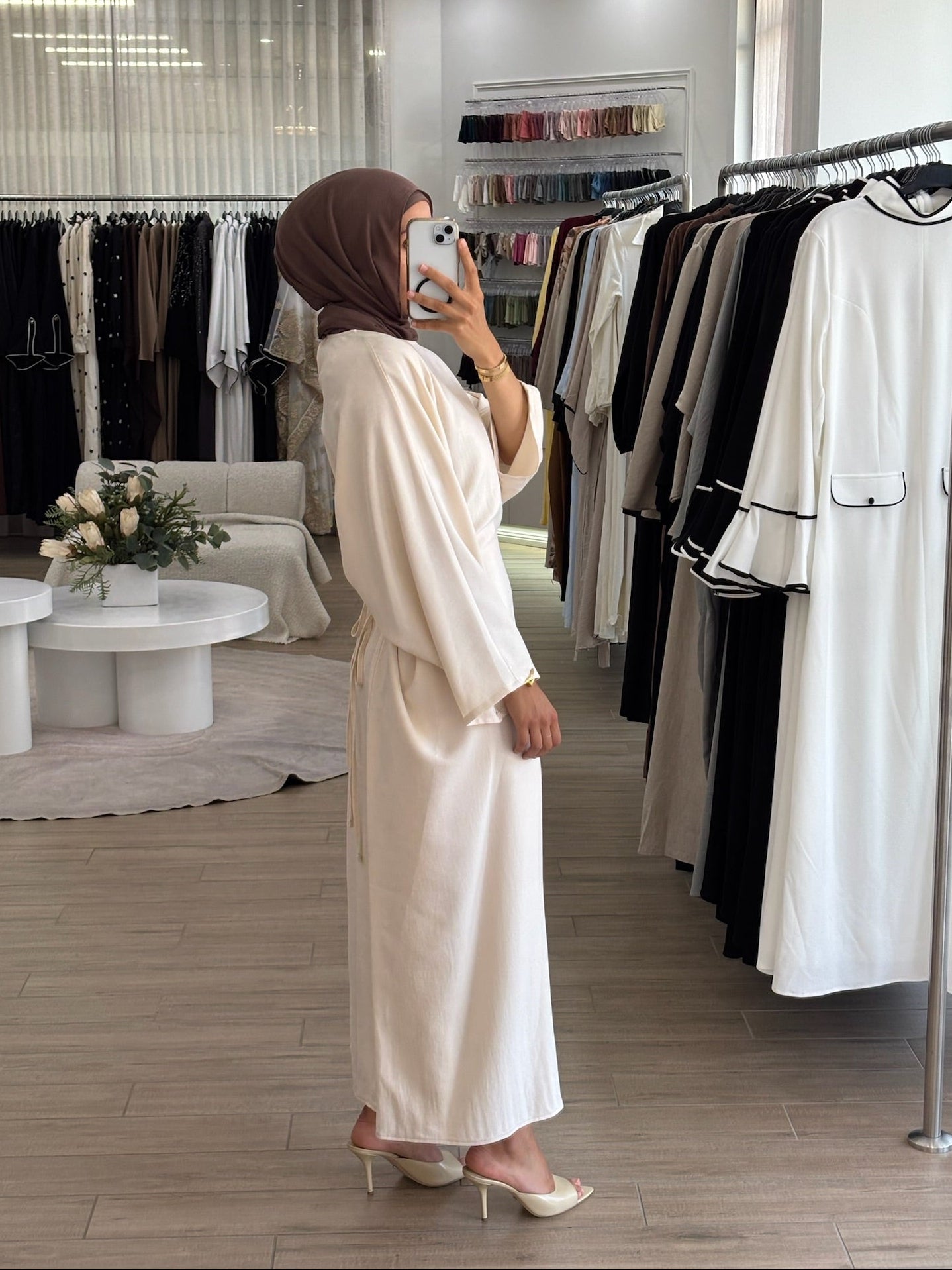 Back view of a wrap two-way dress with a relaxed fit and modest coverage.