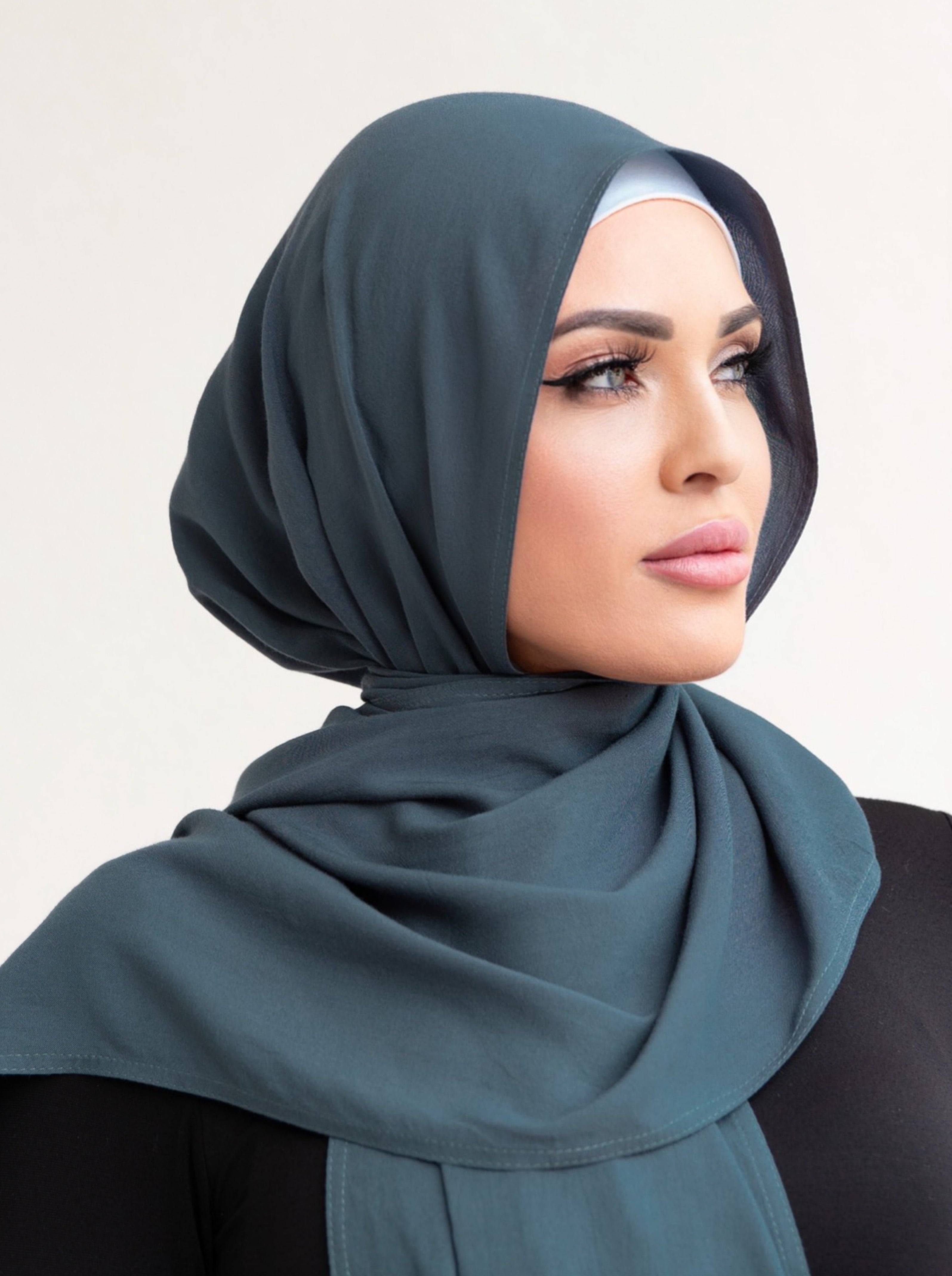 The Miray Long Scarf (hijab) by Veil Of Faith is designed for an extended longer length featuring blind fold stitching. It's made of an ultra comfortable cotton and polyester fabric that's opaque and lightweight.
