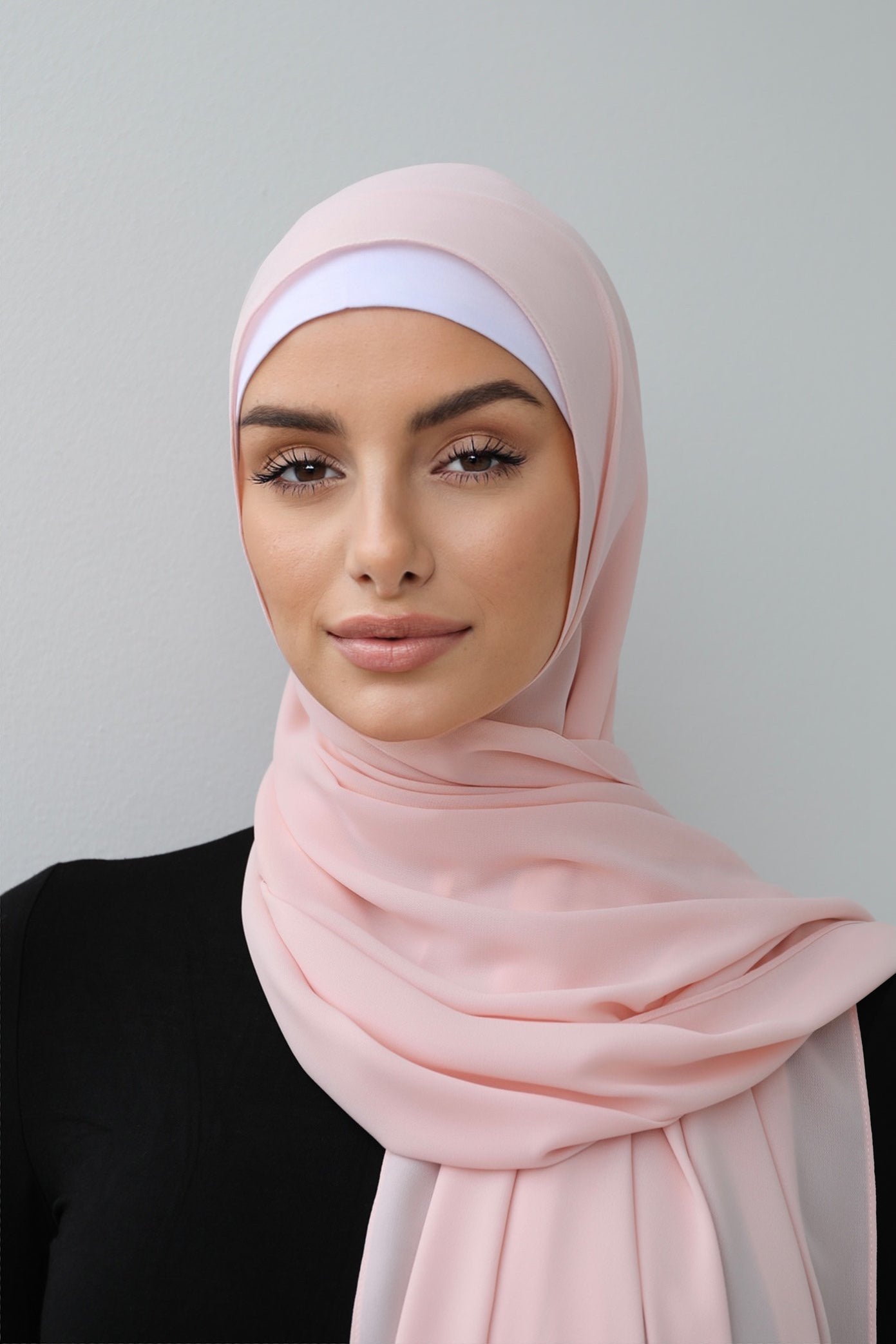 The Opaque Long Scarf (hijab) by Veil Of Faith is made of a thick opaque crepe material.