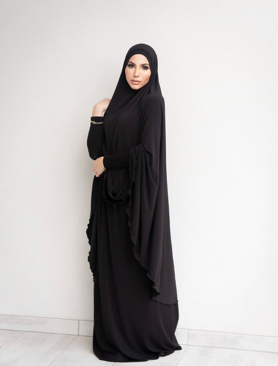 Our signature pray set is made of a loose and comfortable fabric. It features our large signature jilbab and a matching floor length skirt. 