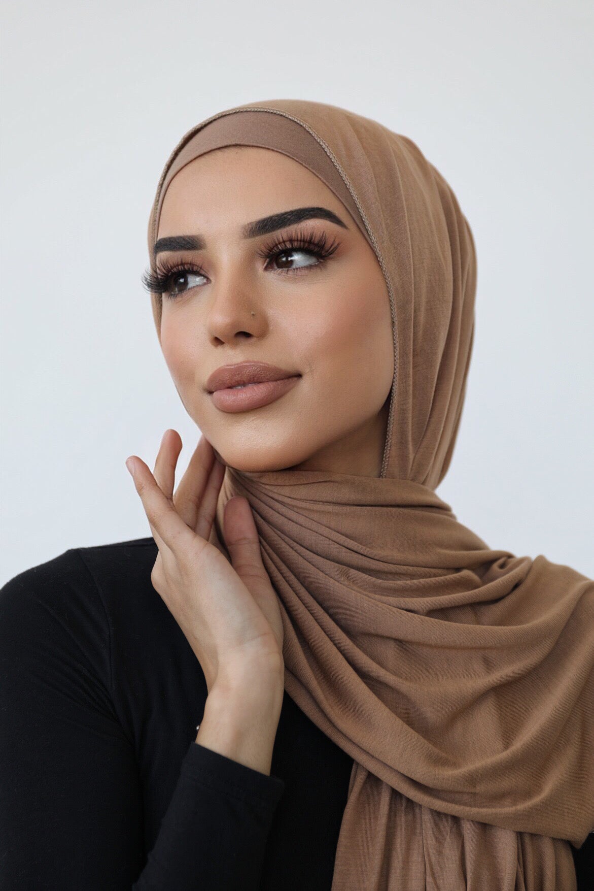 Signature jersey scarf made from soft, stretchy cotton with an extended length for easy wrapping and a secure, comfortable fit around the head.