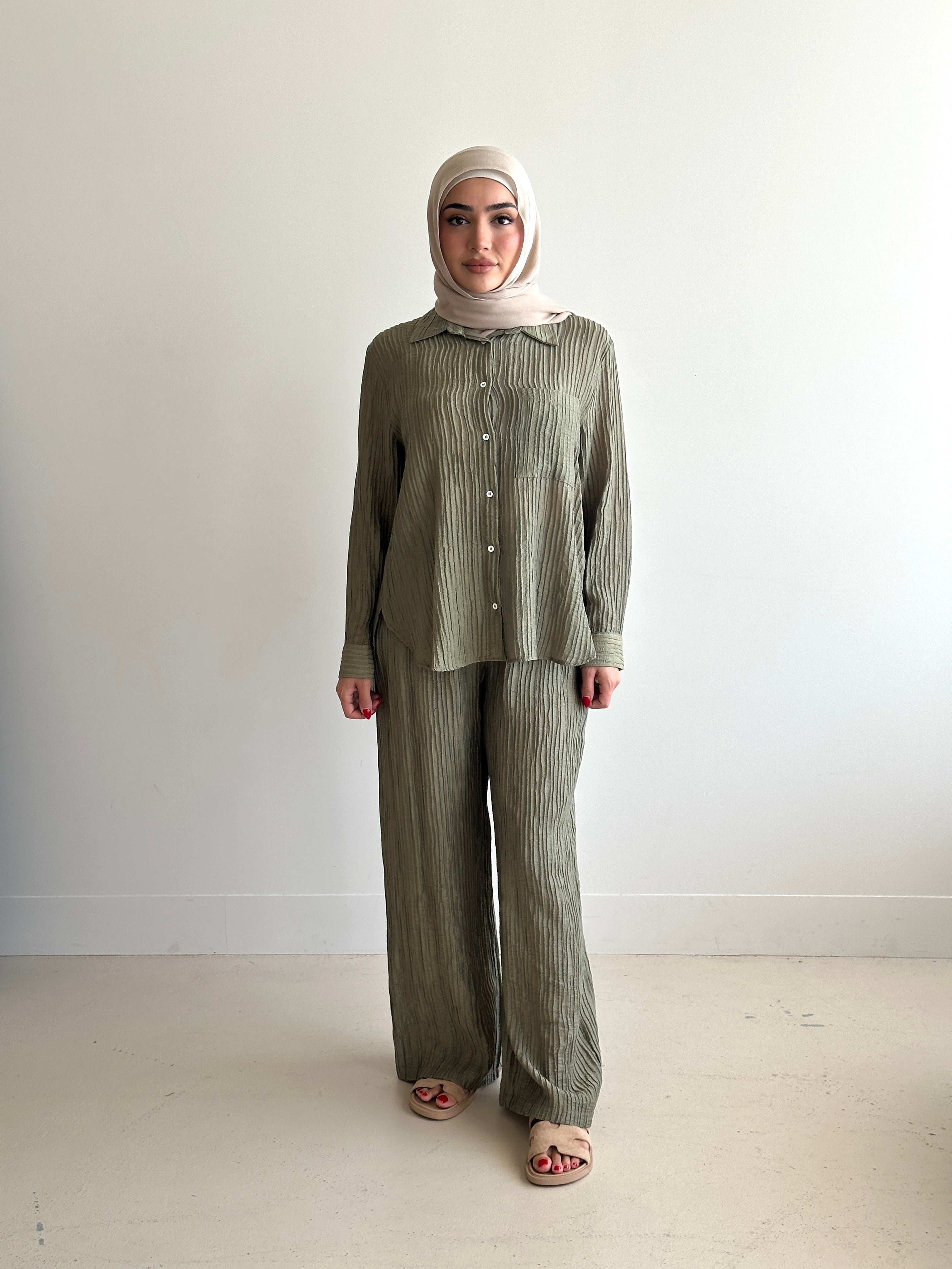 women's 2 piece modest fashion summer set, co-ord includes button up long sleeve shirt with matching loose pant. fabrication is crinkled, lightweight and breathable for summer. can wear it everyday, to work, brunch, picnic and can be transformed to a night outfit to wear with heels and dress it more up for dinner dates. 