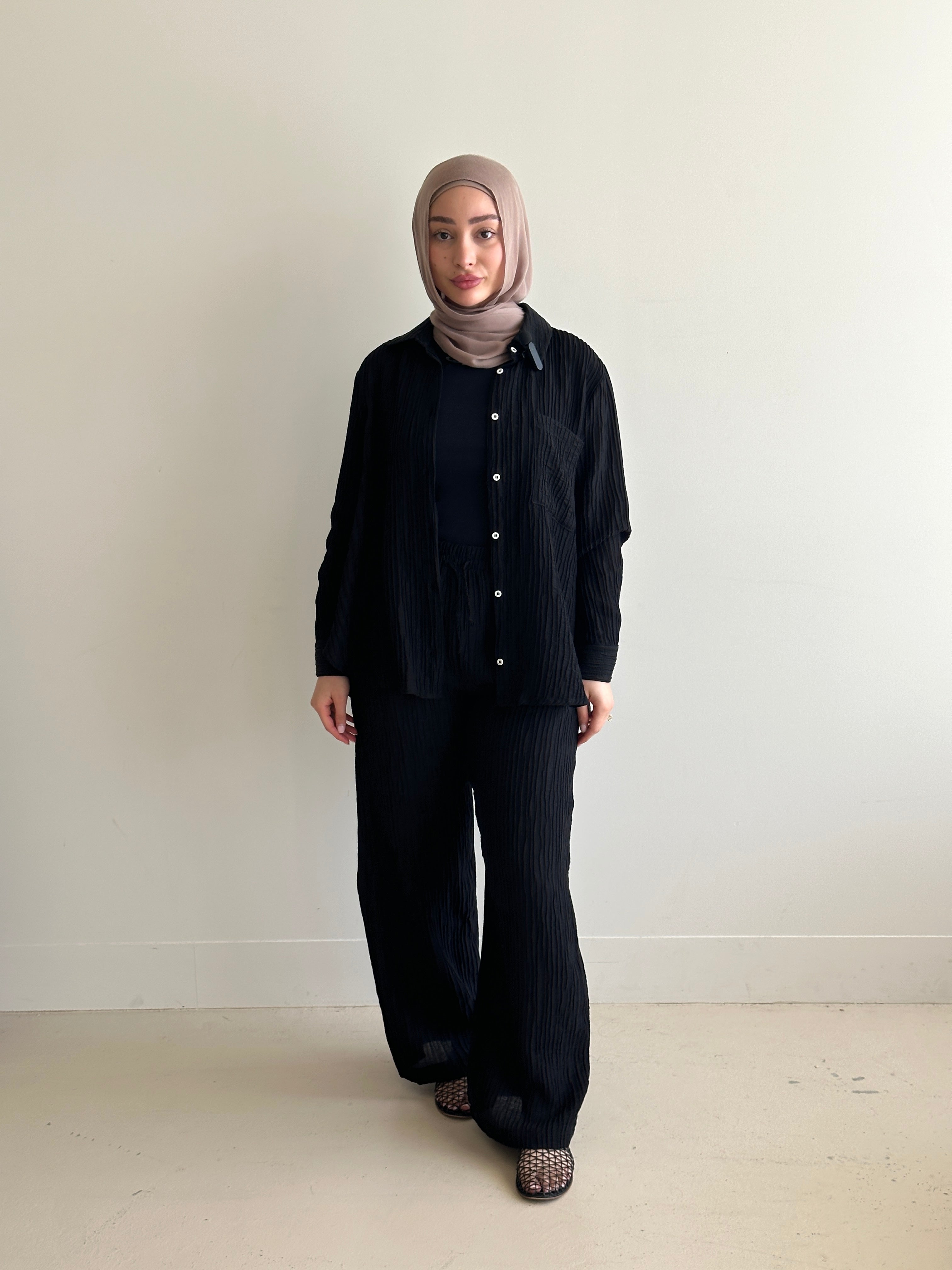 women's 2 piece modest fashion summer set, co-ord includes button up long sleeve shirt with matching loose pant. fabrication is crinkled, lightweight and breathable for summer. can wear it everyday, to work, brunch, picnic and can be transformed to a night outfit to wear with heels and dress it more up for dinner dates. 