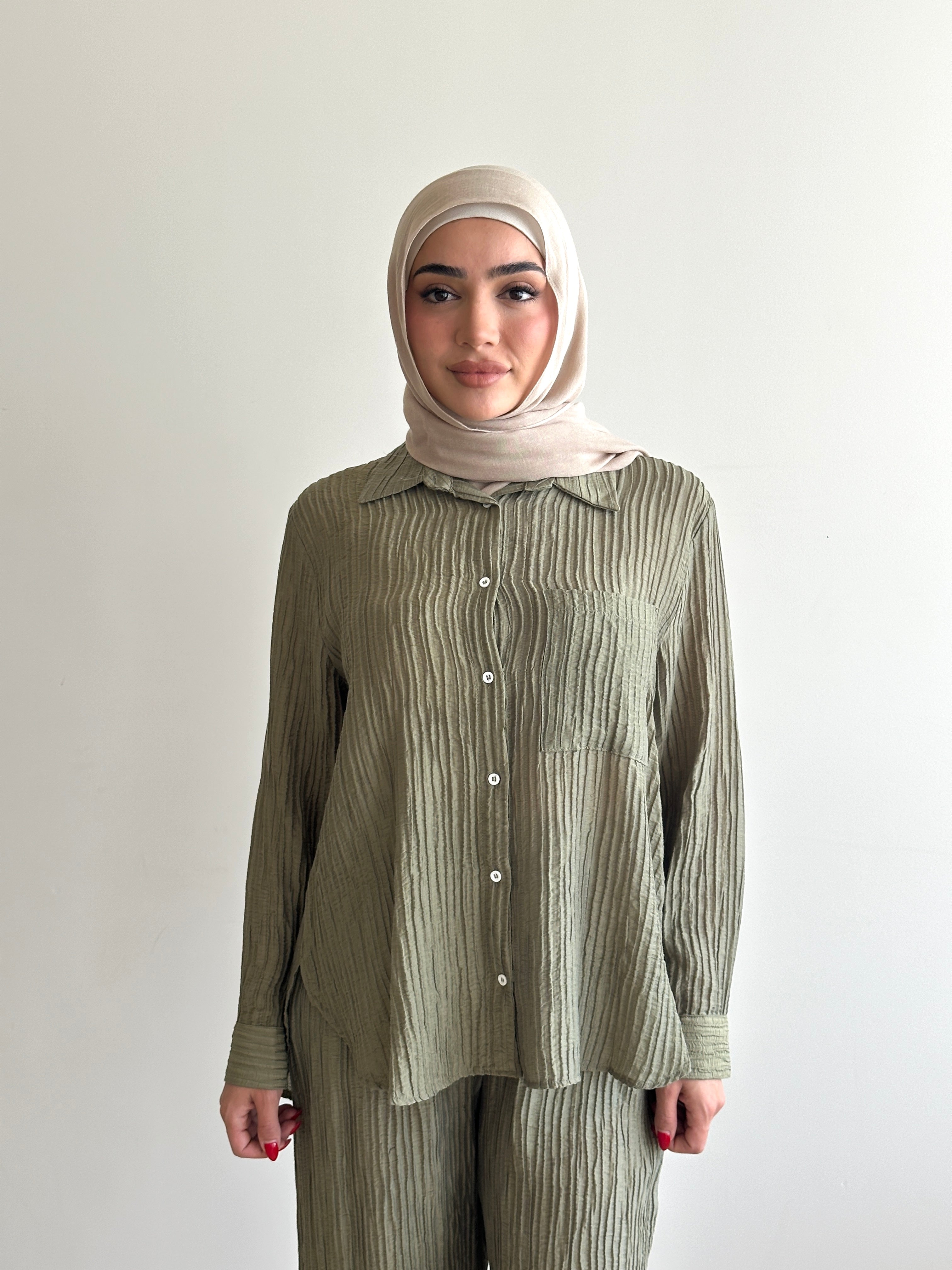 women's 2 piece modest fashion summer set, co-ord includes button up long sleeve shirt with matching loose pant. fabrication is crinkled, lightweight and breathable for summer. can wear it everyday, to work, brunch, picnic and can be transformed to a night outfit to wear with heels and dress it more up for dinner dates. 