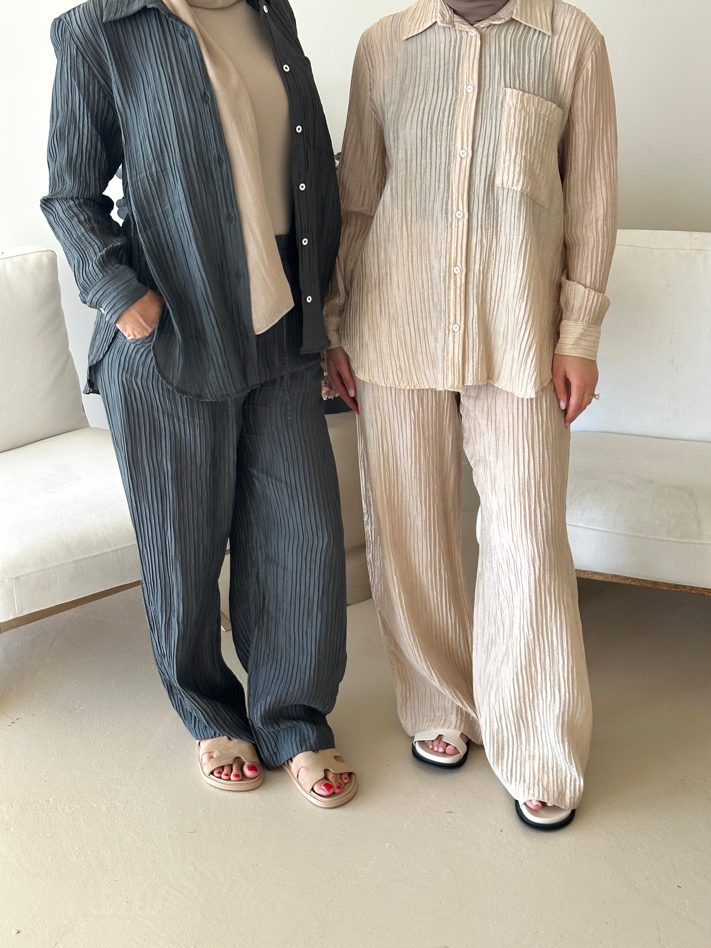 women's 2 piece modest fashion summer set, co-ord includes button up long sleeve shirt with matching loose pant. fabrication is crinkled, lightweight and breathable for summer. can wear it everyday, to work, brunch, picnic and can be transformed to a night outfit to wear with heels and dress it more up for dinner dates. 