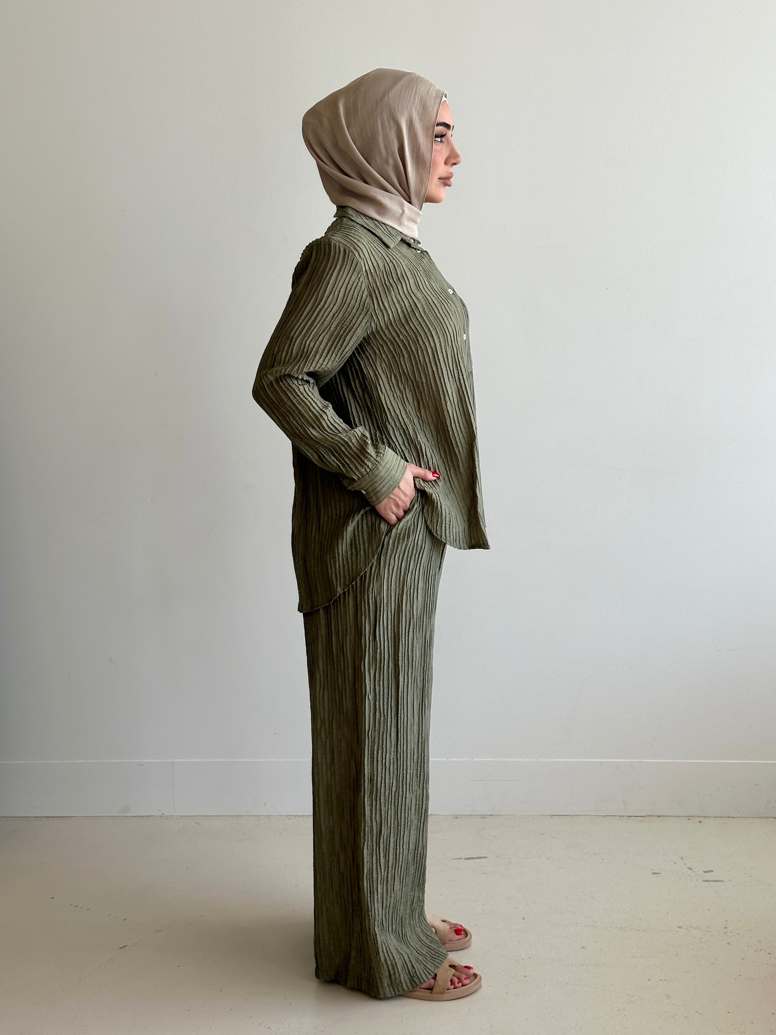 women's 2 piece modest fashion summer set, co-ord includes button up long sleeve shirt with matching loose pant. fabrication is crinkled, lightweight and breathable for summer. can wear it everyday, to work, brunch, picnic and can be transformed to a night outfit to wear with heels and dress it more up for dinner dates. 