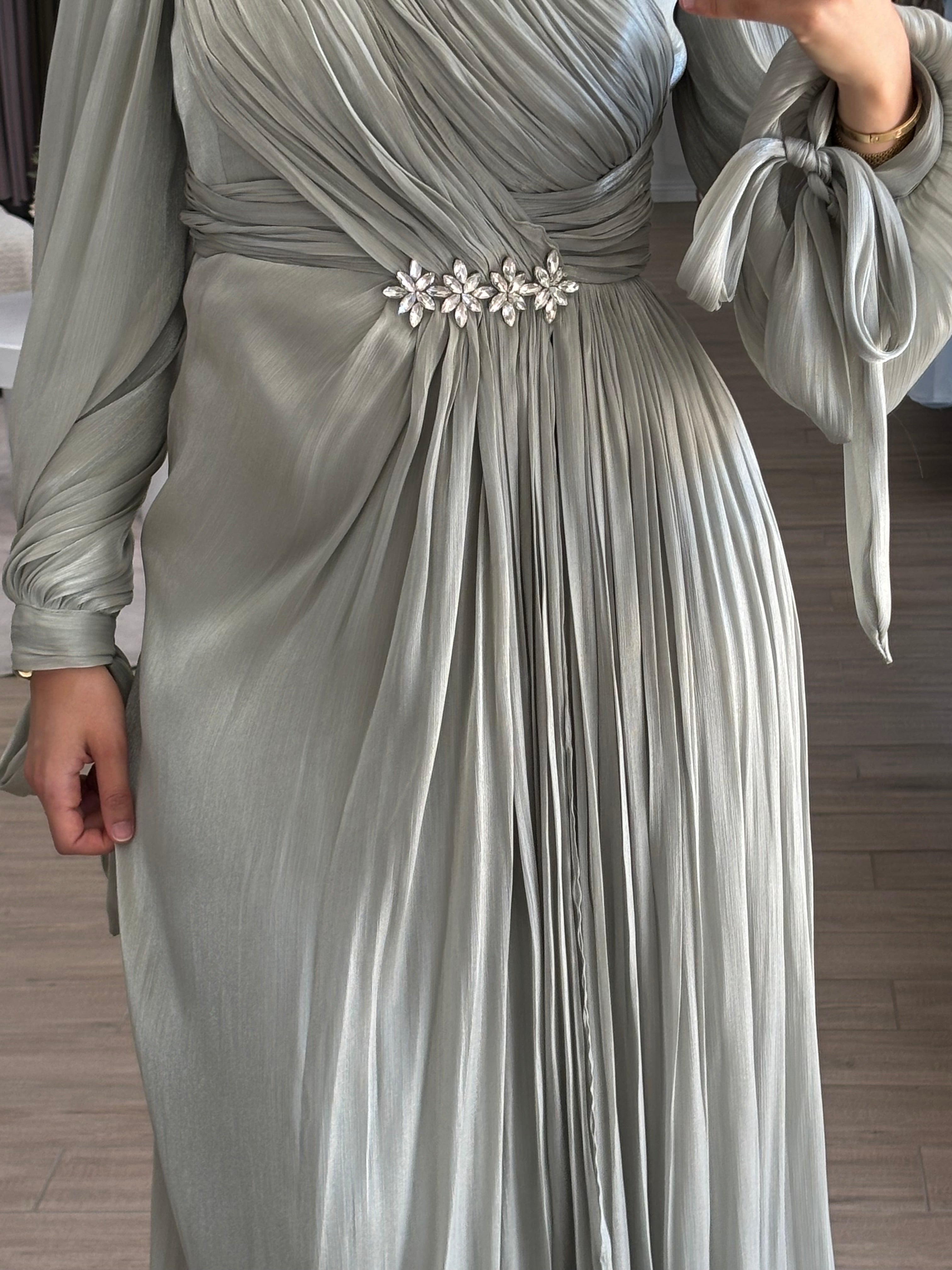 women's modest formal dress, hijabi friendly and is full coverage, full length, maxi and long sleeve with minimal embellishment, suitable for occasions, formals, engagements, nikkah, kk, pre-wedding events, weddings. 