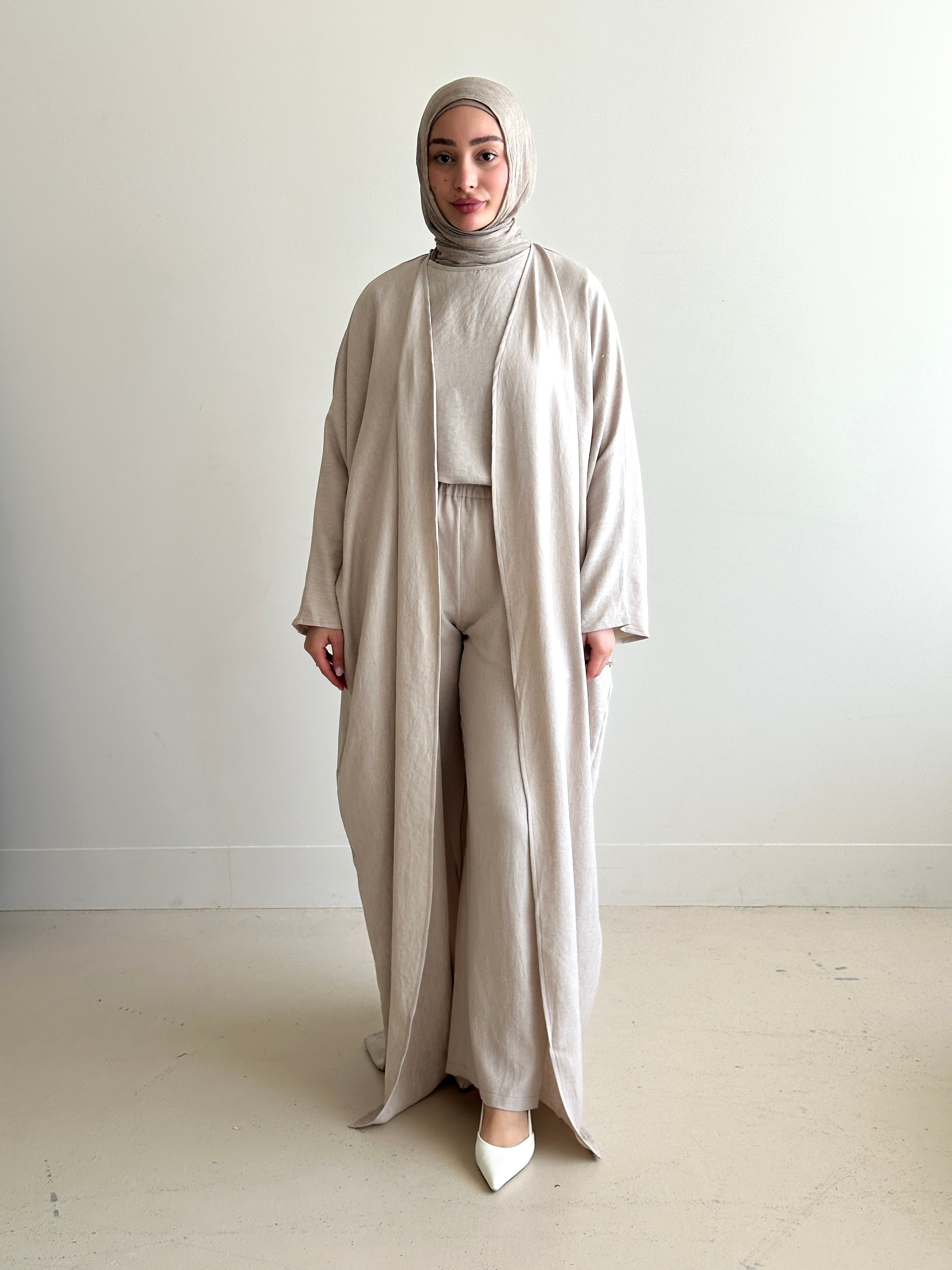 women's 3 piece set. includes loose pant with sleeveless top and full length kimono. available in 4 colours. set is lightweight, loose, comfortable, versatile, modest with full coverage and is for hijabi muslim women. Beautiful to wear dressed down or up- brunch, picnic, gatherings, dinners, engagement, day/night event and graduations. 