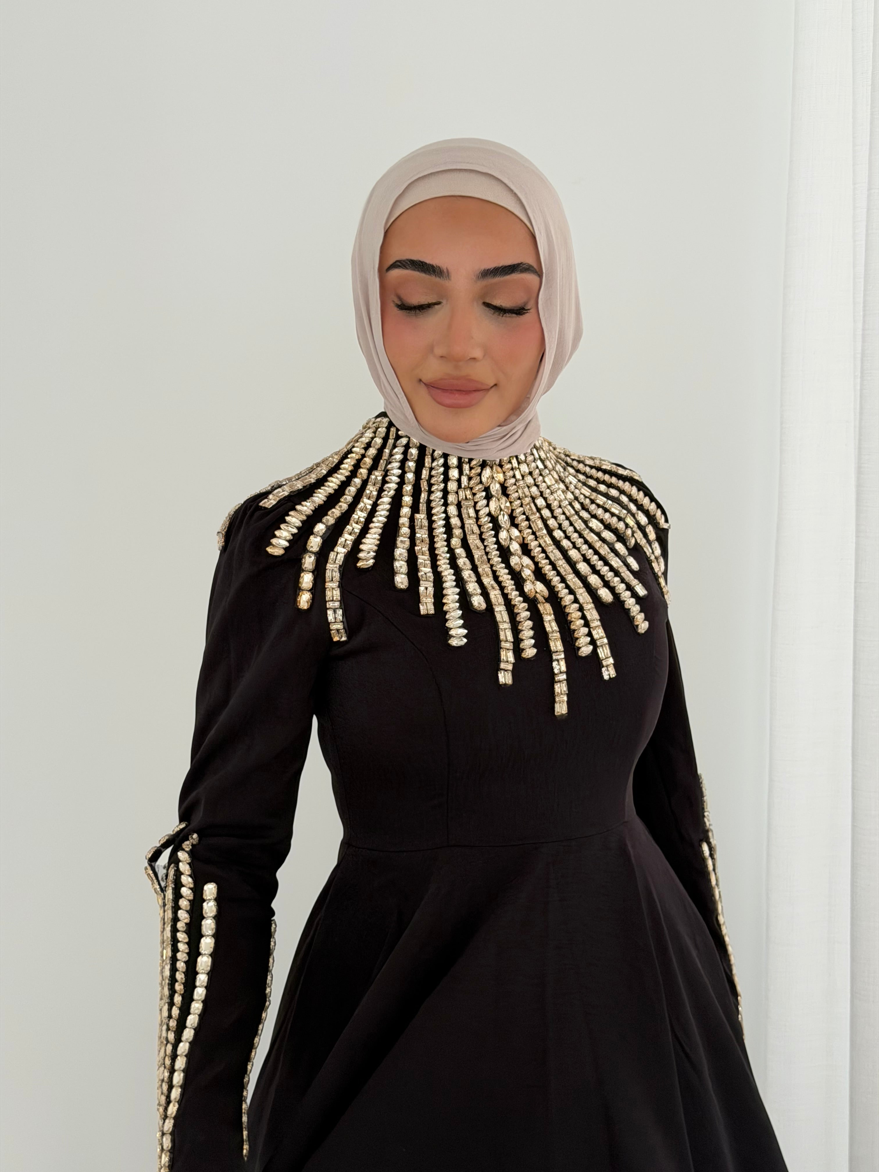 women's formal dress- maxi, full length with long sleeves and offers modest coverage with gold embellishment. Suitable to wear for occasions, engagement, wedding, formals etc. 