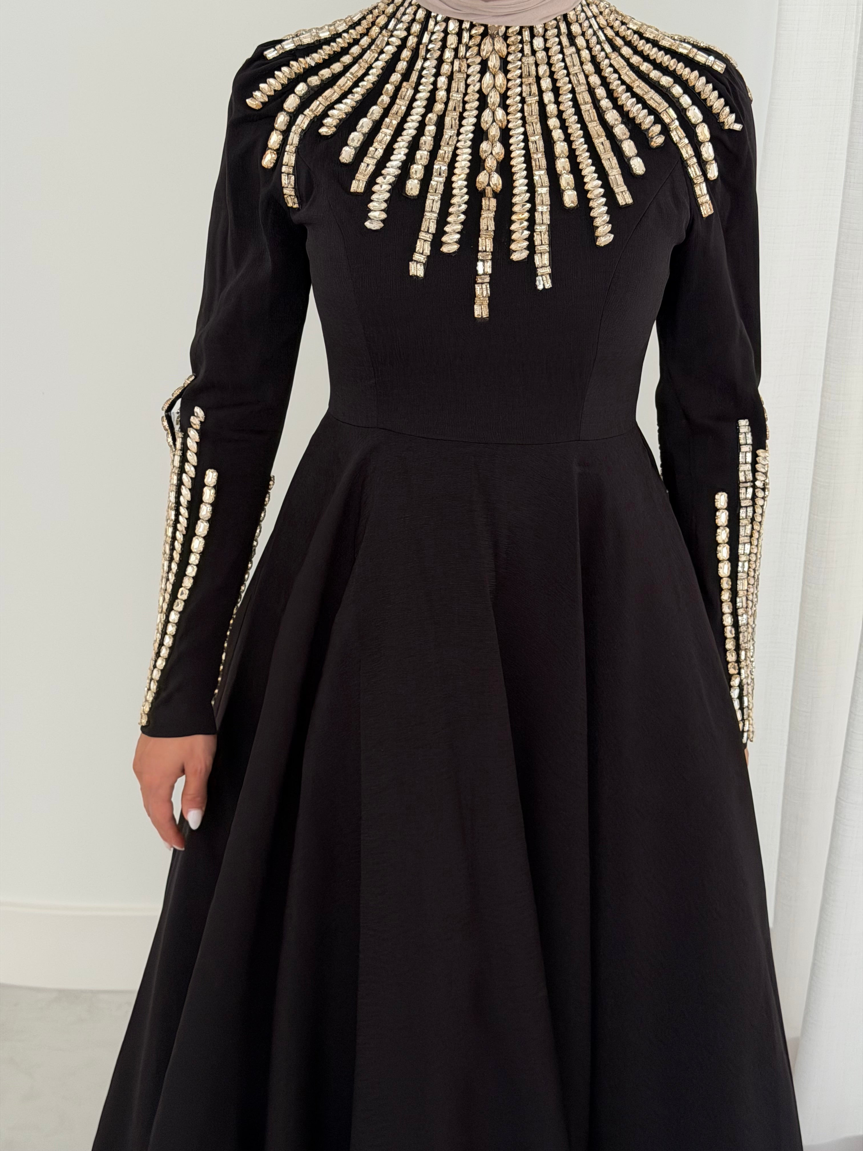 women's formal dress- maxi, full length with long sleeves and offers modest coverage with gold embellishment. Suitable to wear for occasions, engagement, wedding, formals etc. 