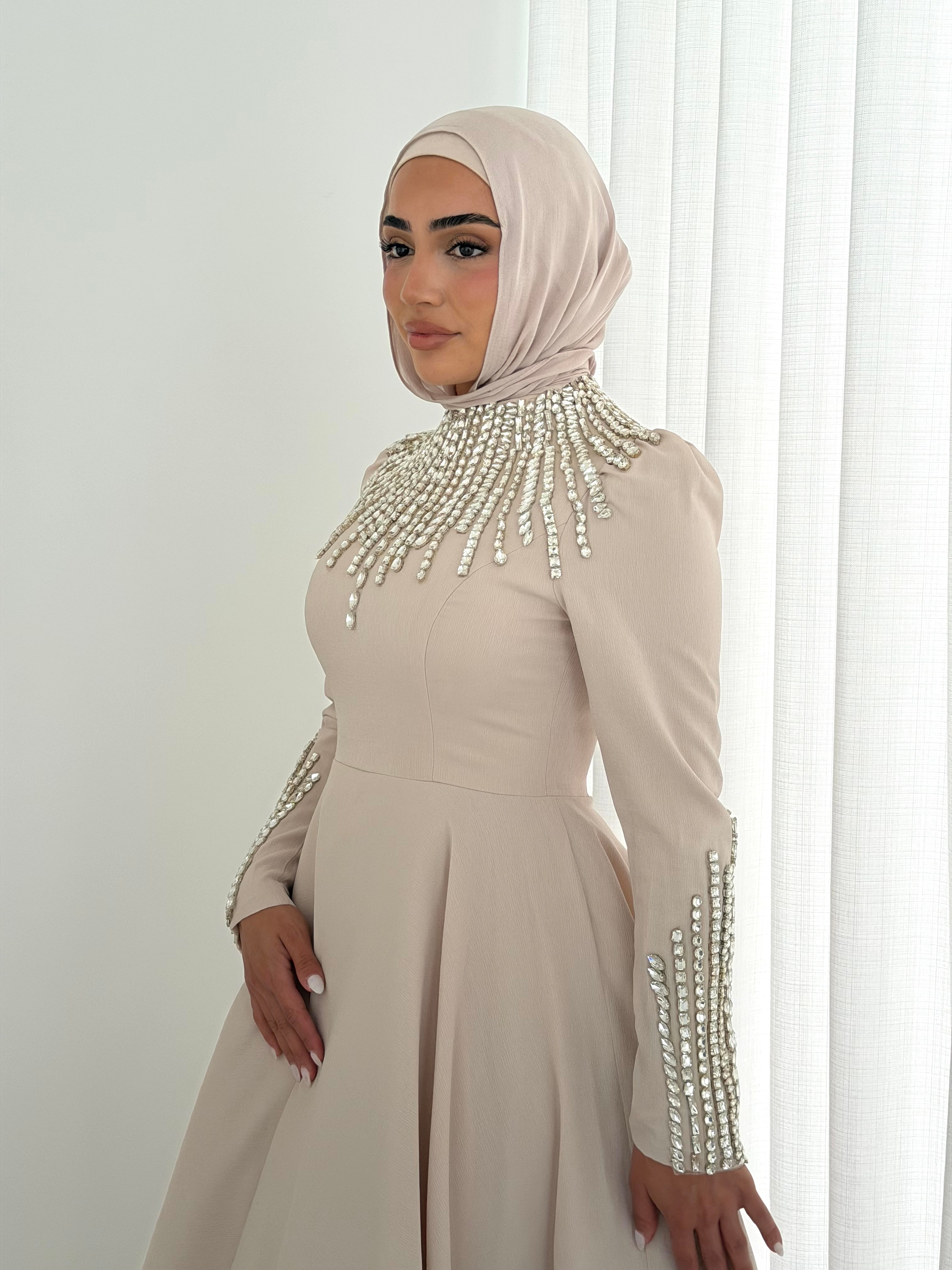 women's formal dress- maxi, full length with long sleeves and offers modest coverage with gold embellishment. Suitable to wear for occasions, engagement, wedding, formals etc. 