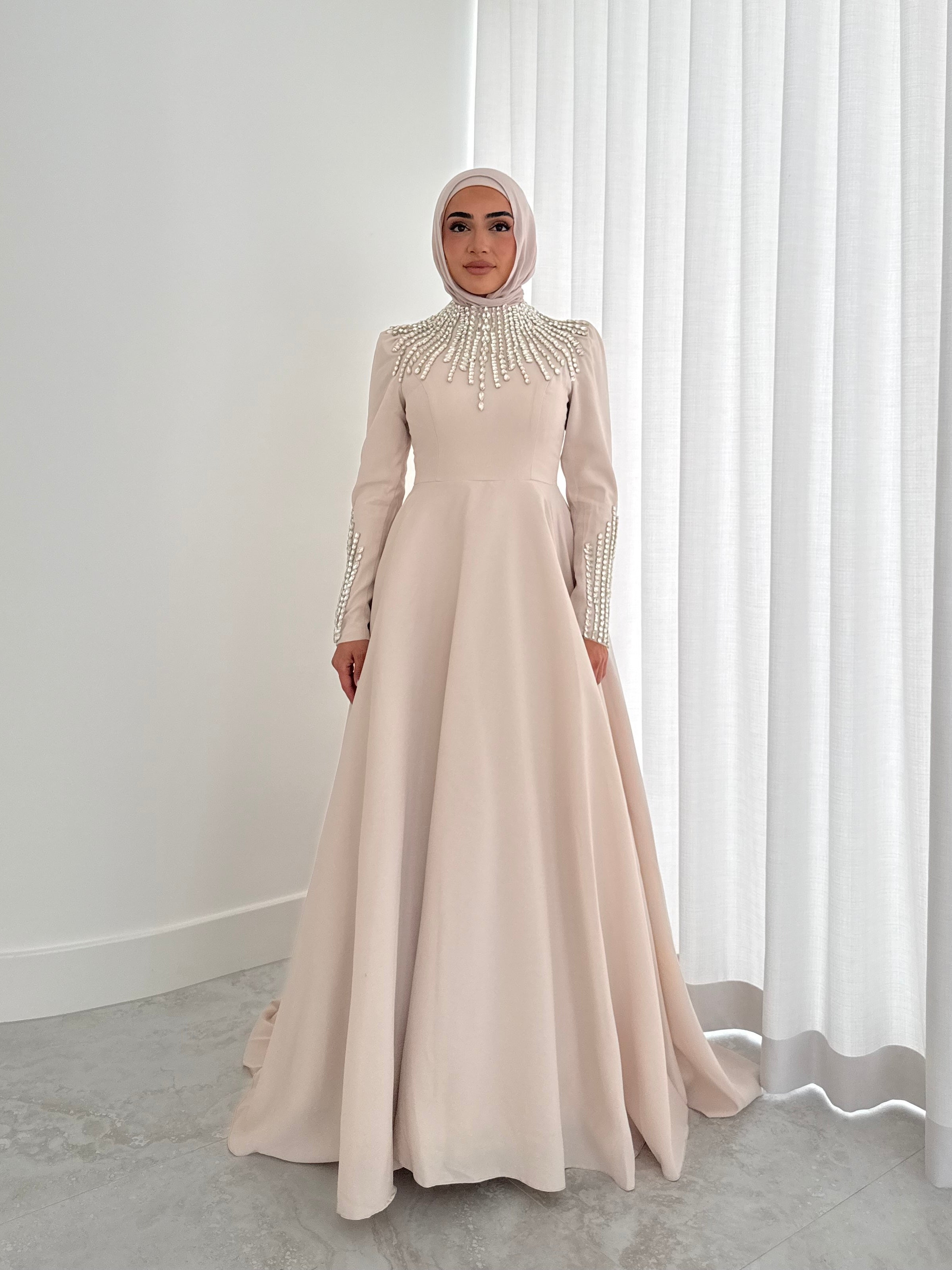 women's formal dress- maxi, full length with long sleeves and offers modest coverage with gold embellishment. Suitable to wear for occasions, engagement, wedding, formals etc. 