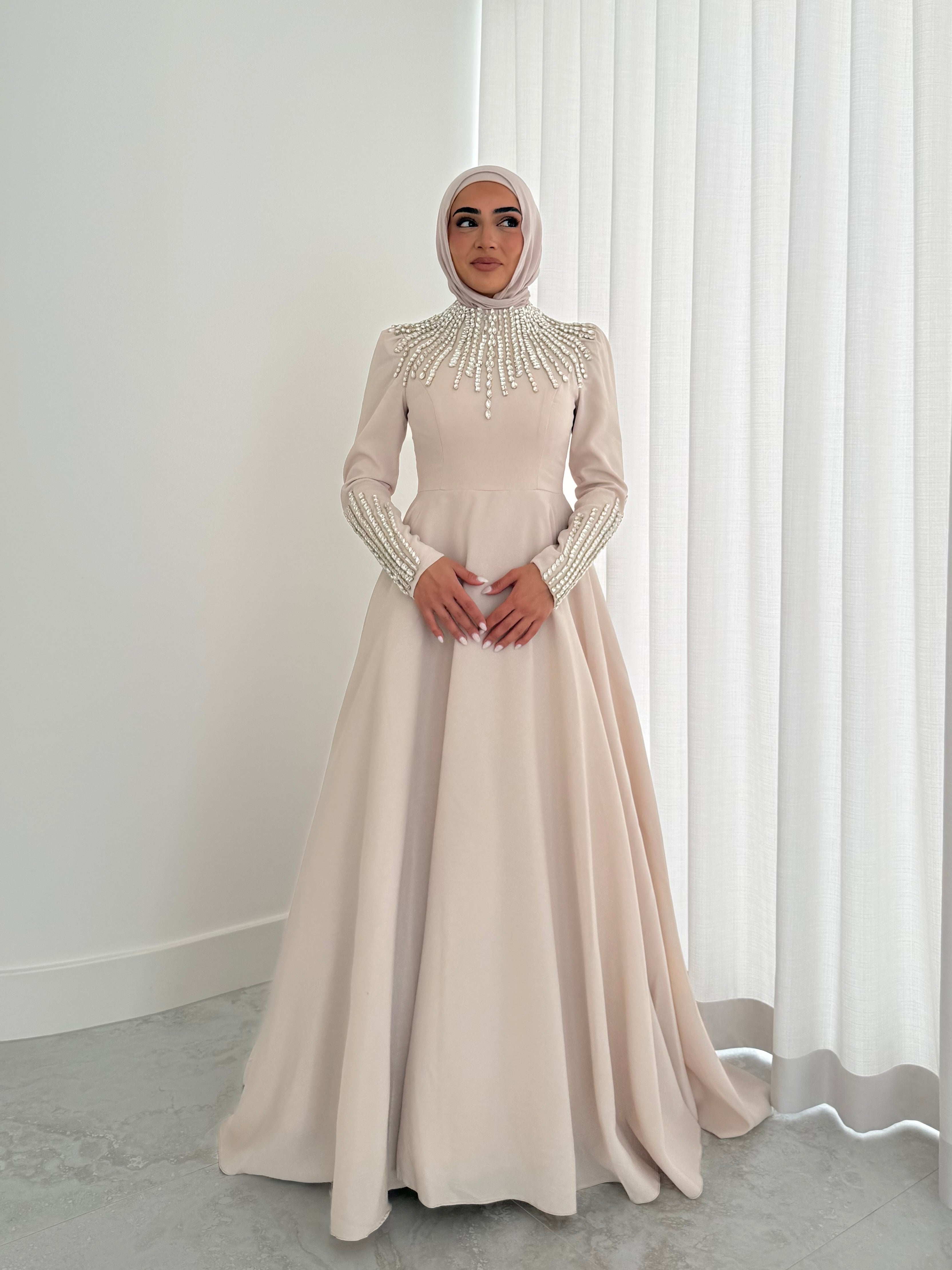 women's formal dress- maxi, full length with long sleeves and offers modest coverage with gold embellishment. Suitable to wear for occasions, engagement, wedding, formals etc. 