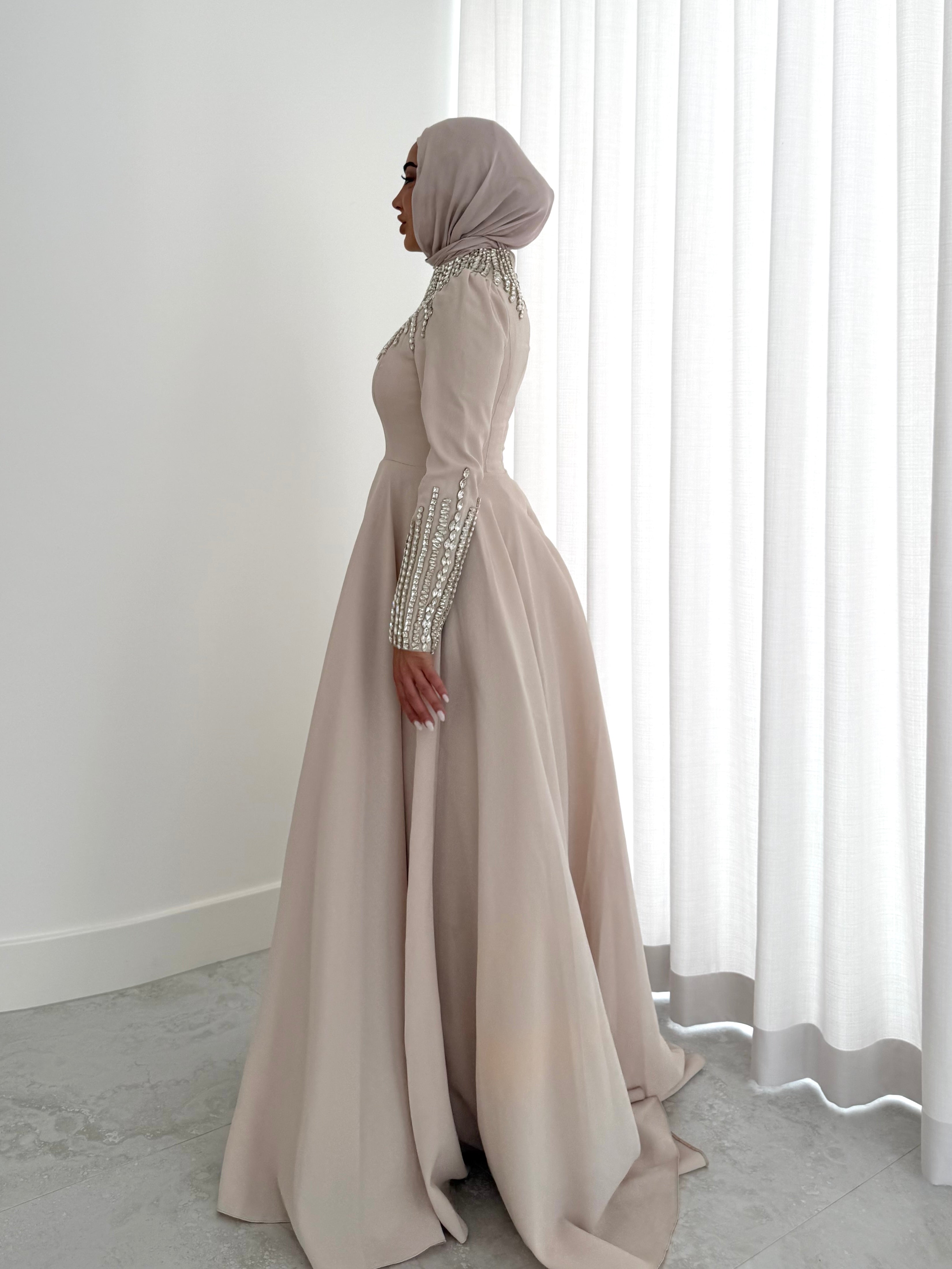 women's formal dress- maxi, full length with long sleeves and offers modest coverage with gold embellishment. Suitable to wear for occasions, engagement, wedding, formals etc. 