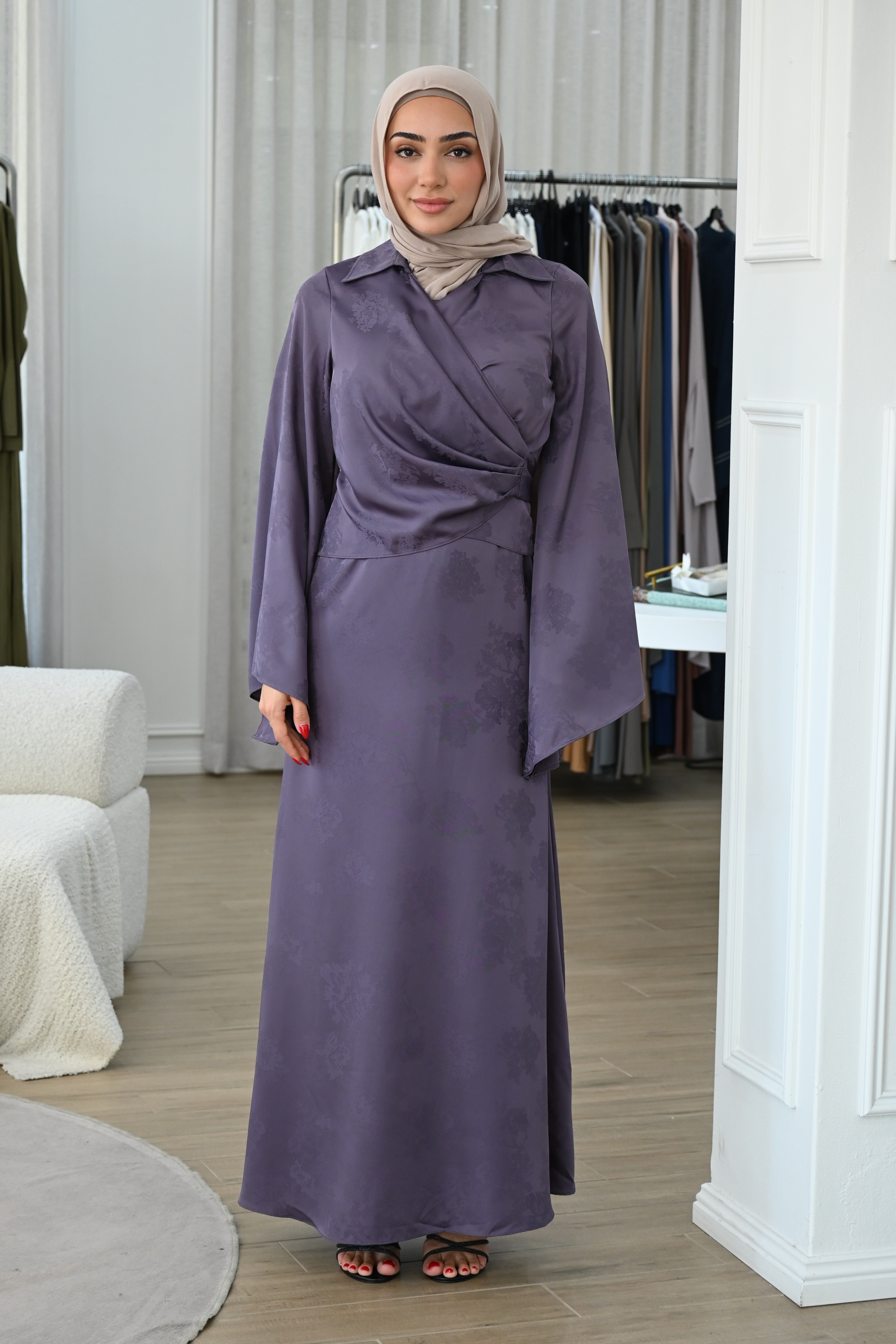 Cross over bodice creates a soft wrap effect that cinches gently at the waist, while the flowing A-line skirt offers graceful movement with every step.