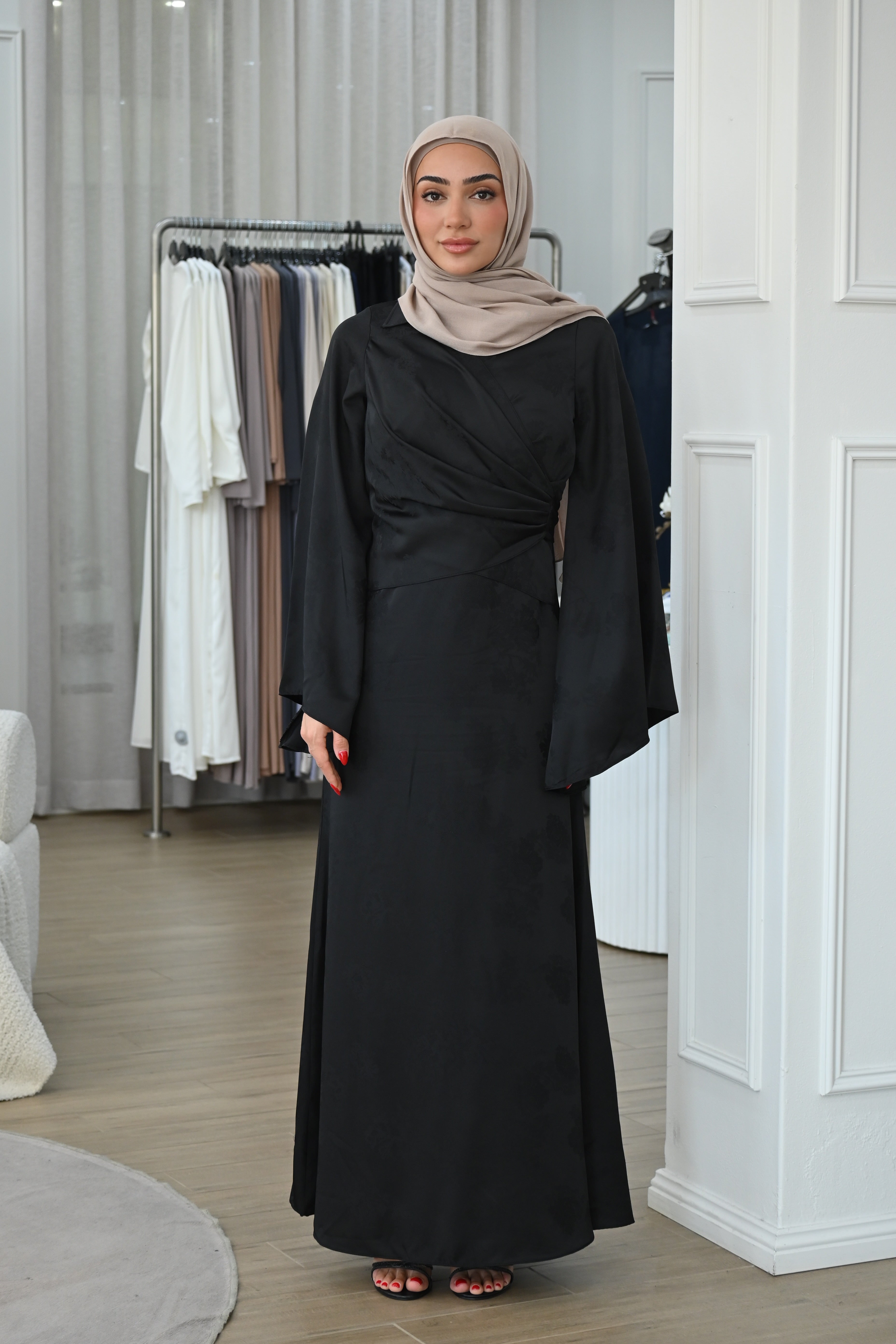 Cross over bodice creates a soft wrap effect that cinches gently at the waist, while the flowing A-line skirt offers graceful movement with every step.