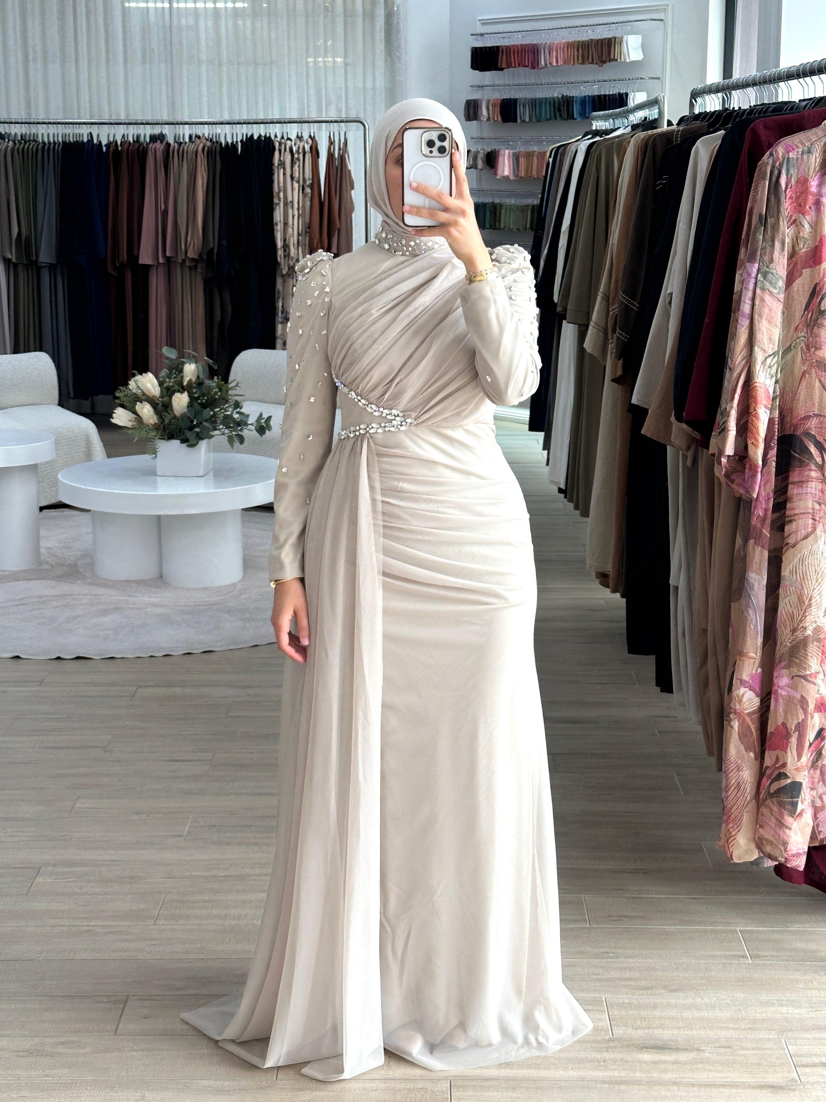 Women's modest formal dress in nude for any occasion, party, engagement, wedding event. long sleeve, full length maxi dress with embellishments and tulle fabrication for hijabi modest fashion