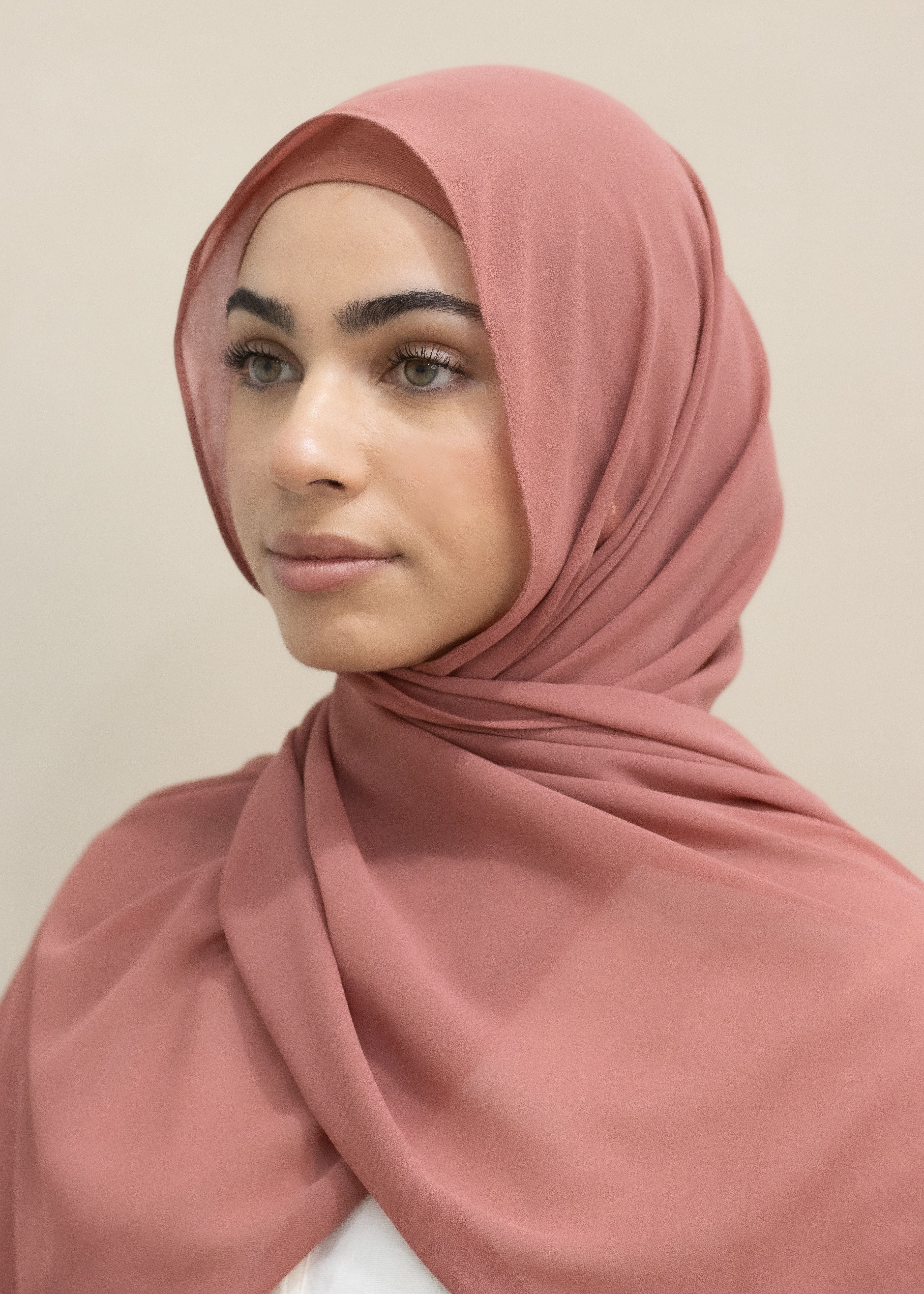 They offer the elegance of chiffon whilst being slightly opaquer, has a non-slip finish, still giving you that flowy look. Perfect or everyday wear or occasions, these hijabs drape beautifully and are comfortable.&nbsp;