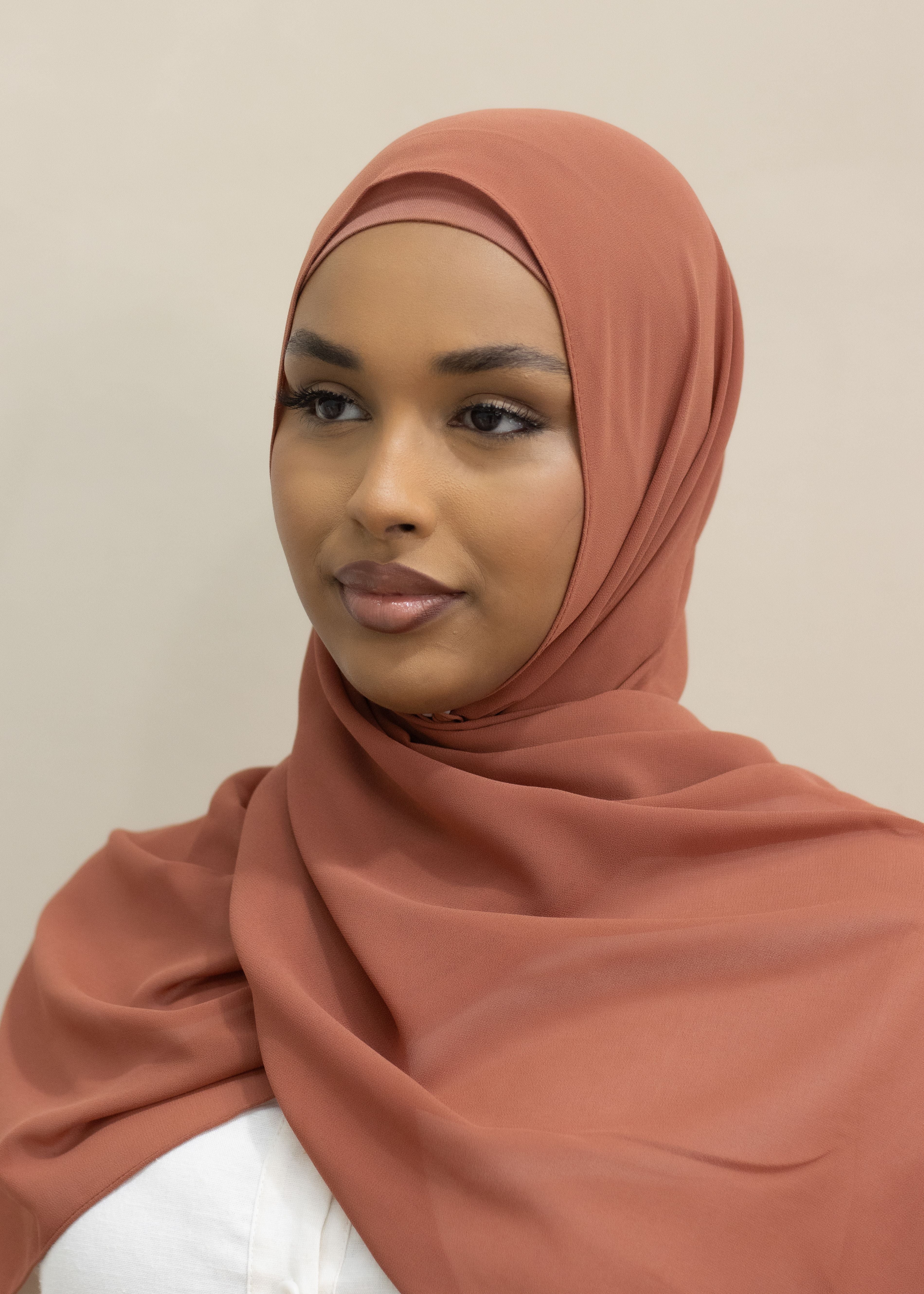 They offer the elegance of chiffon whilst being slightly opaquer, has a non-slip finish, still giving you that flowy look. Perfect or everyday wear or occasions, these hijabs drape beautifully and are comfortable. 