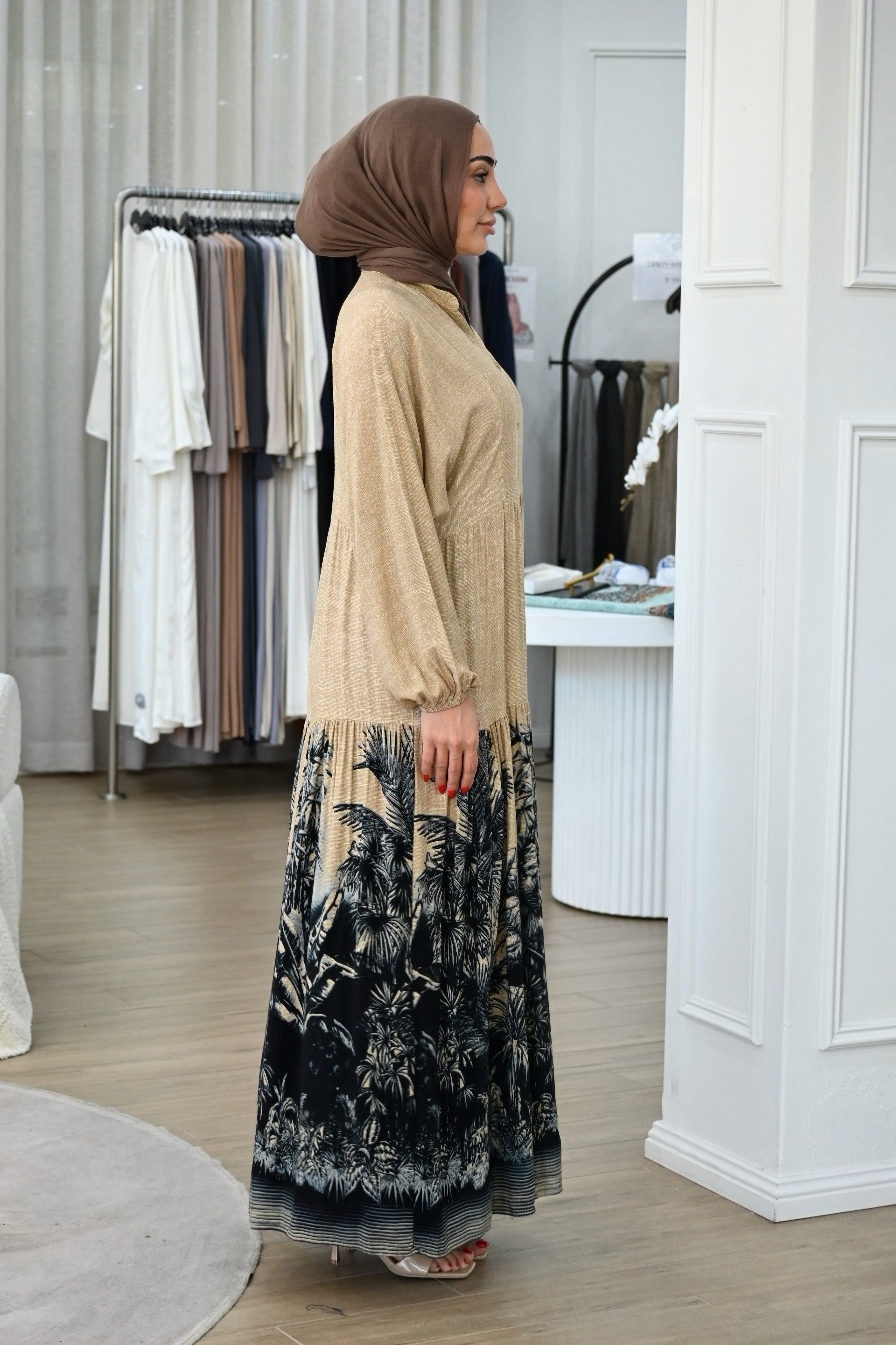 Effortlessly elegant and designed for everyday comfort, this cotton dress features a relaxed silhouette that flows beautifully with movement. Crafted from breathable cotton, it offers a lightweight feel ideal for warm days while maintaining a modest, refined look.