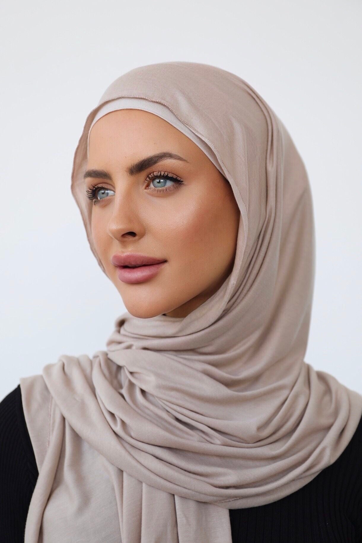 Signature jersey scarf made from soft, stretchy cotton with an extended length for easy wrapping and a secure, comfortable fit around the head.