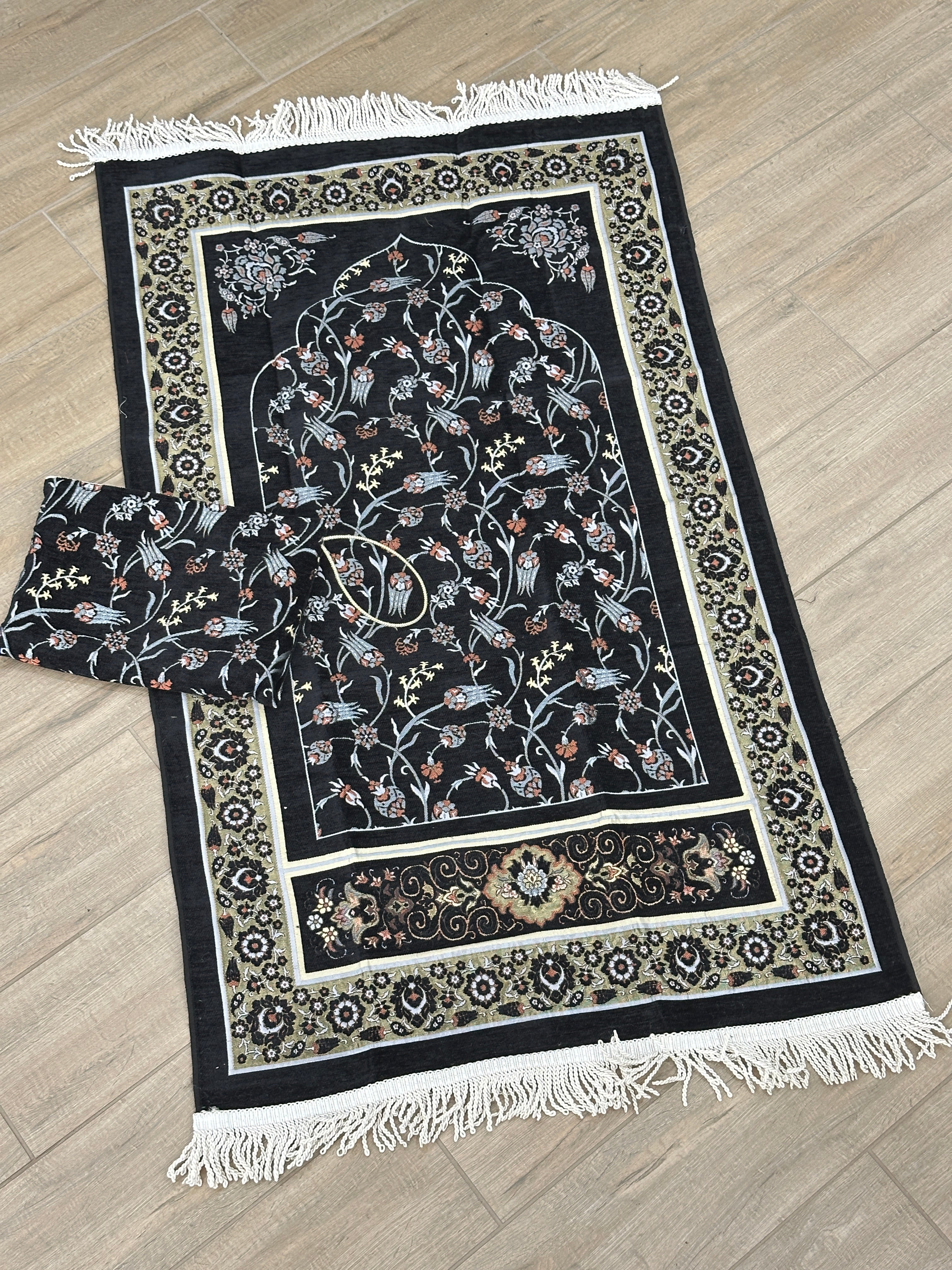 Embroidered Travel Prayer Mat with delicate embroidery, lightweight and portable for use on the go. Ideal for handbags, cars, work totes, or travel, providing a practical and elegant solution for performing salah anywhere.