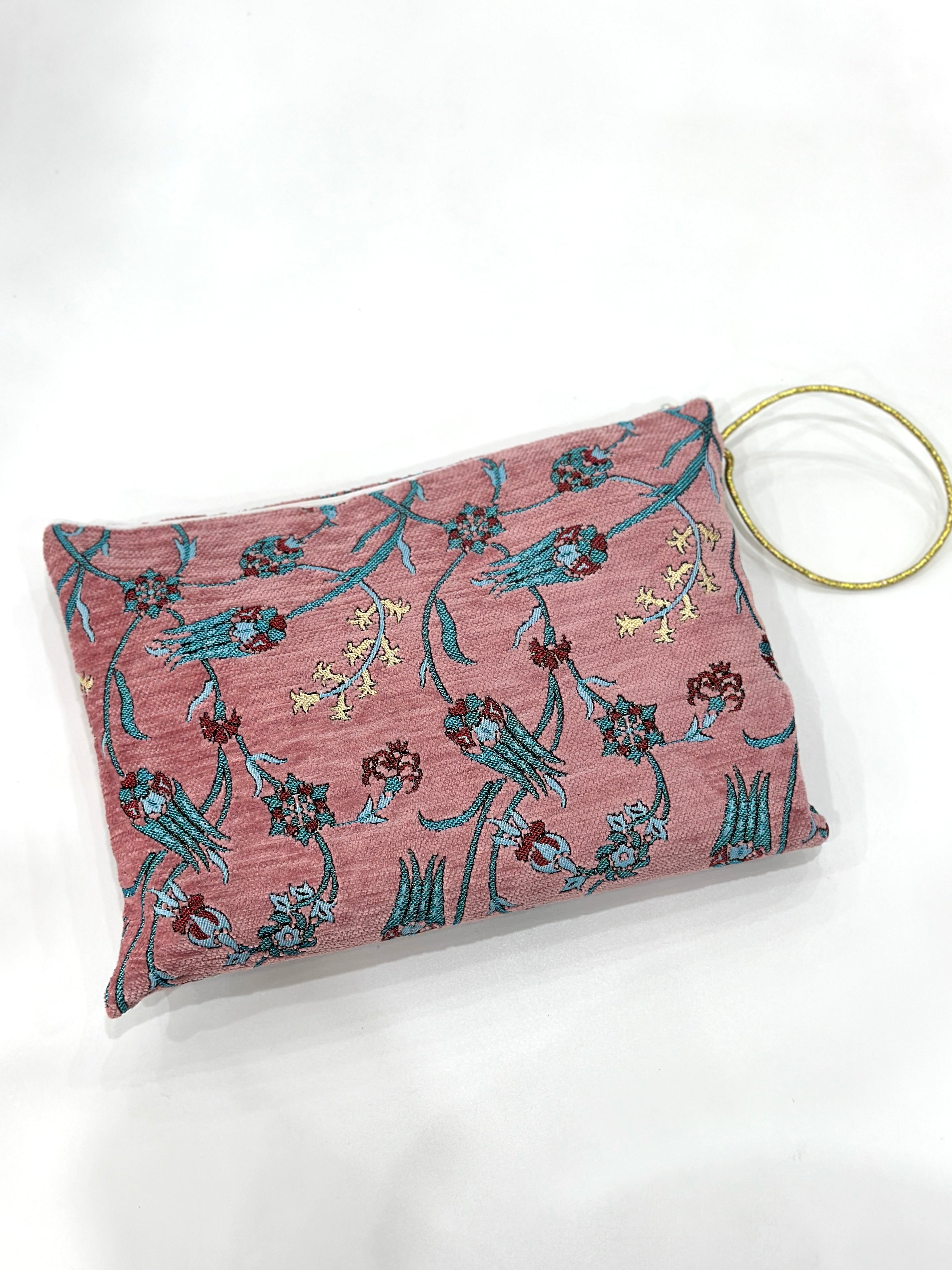 Embroidered Travel Prayer Mat with delicate embroidery, lightweight and portable for use on the go. Ideal for handbags, cars, work totes, or travel, providing a practical and elegant solution for performing salah anywhere.