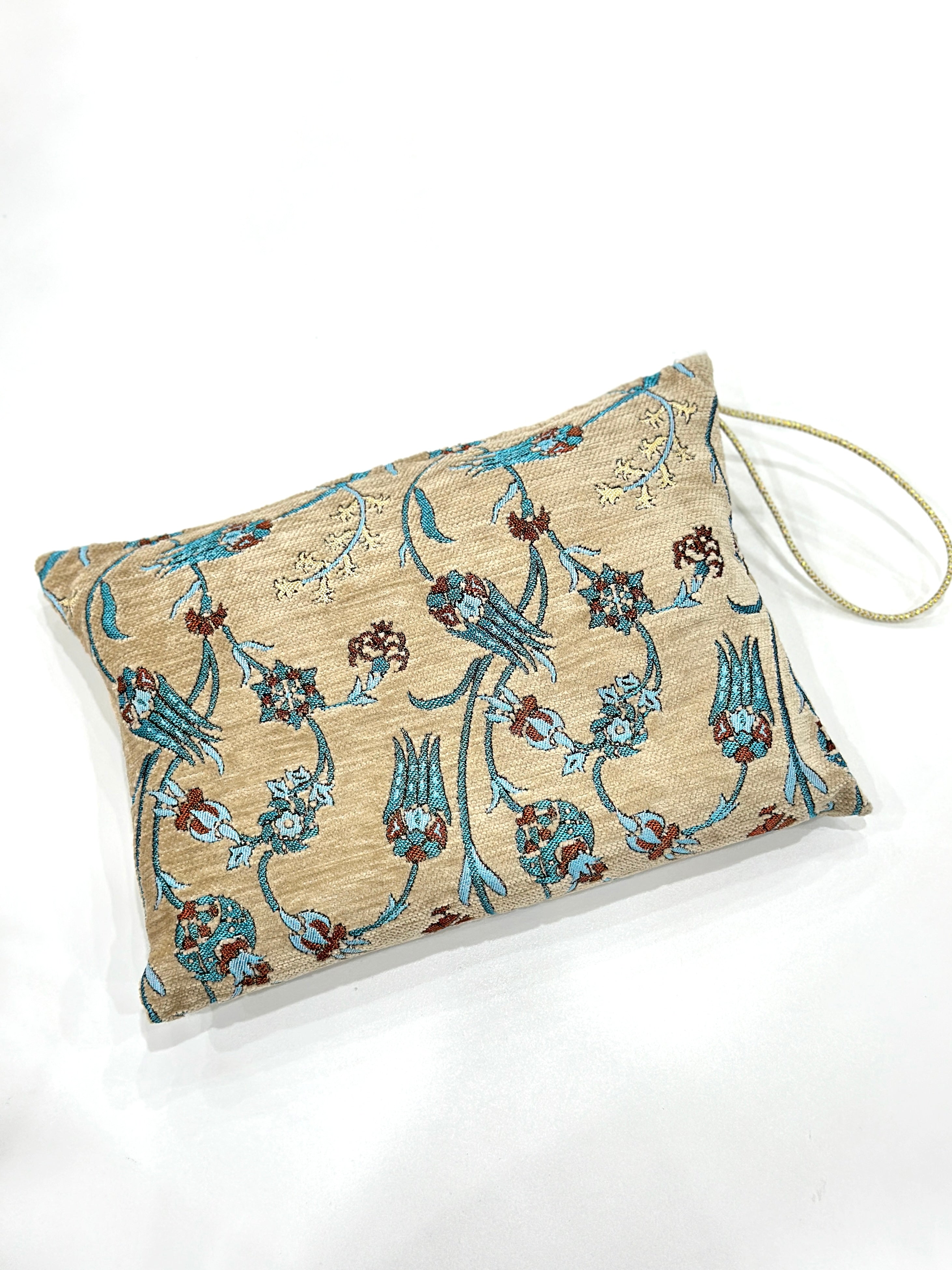 Embroidered Travel Prayer Mat with delicate embroidery, lightweight and portable for use on the go. Ideal for handbags, cars, work totes, or travel, providing a practical and elegant solution for performing salah anywhere.