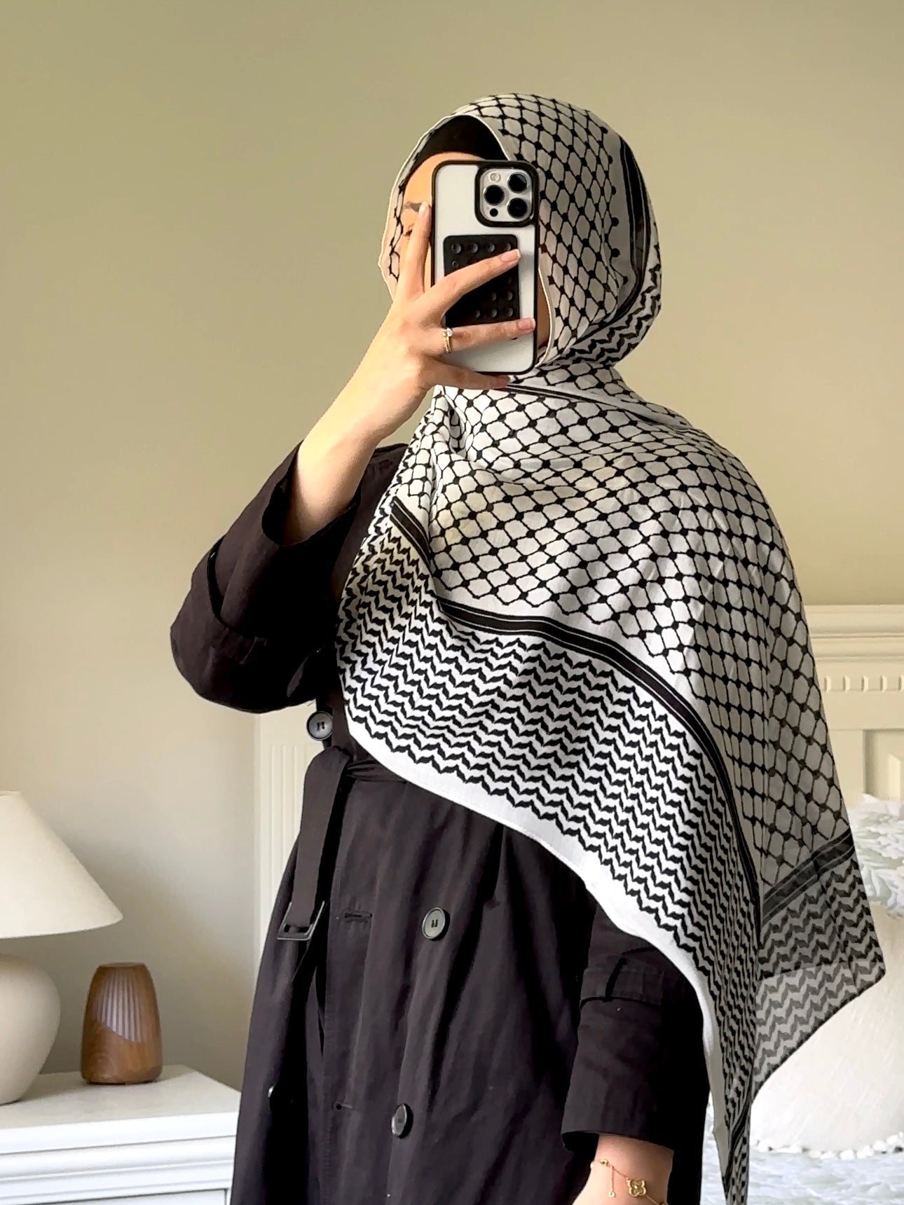 Modal Keffiyeh Print Hijab featuring a traditional keffiyeh-inspired pattern, measuring 180cm x 70cm. Soft, lightweight fabric with generous coverage. A portion of proceeds supports relief efforts in Palestine and Lebanon.