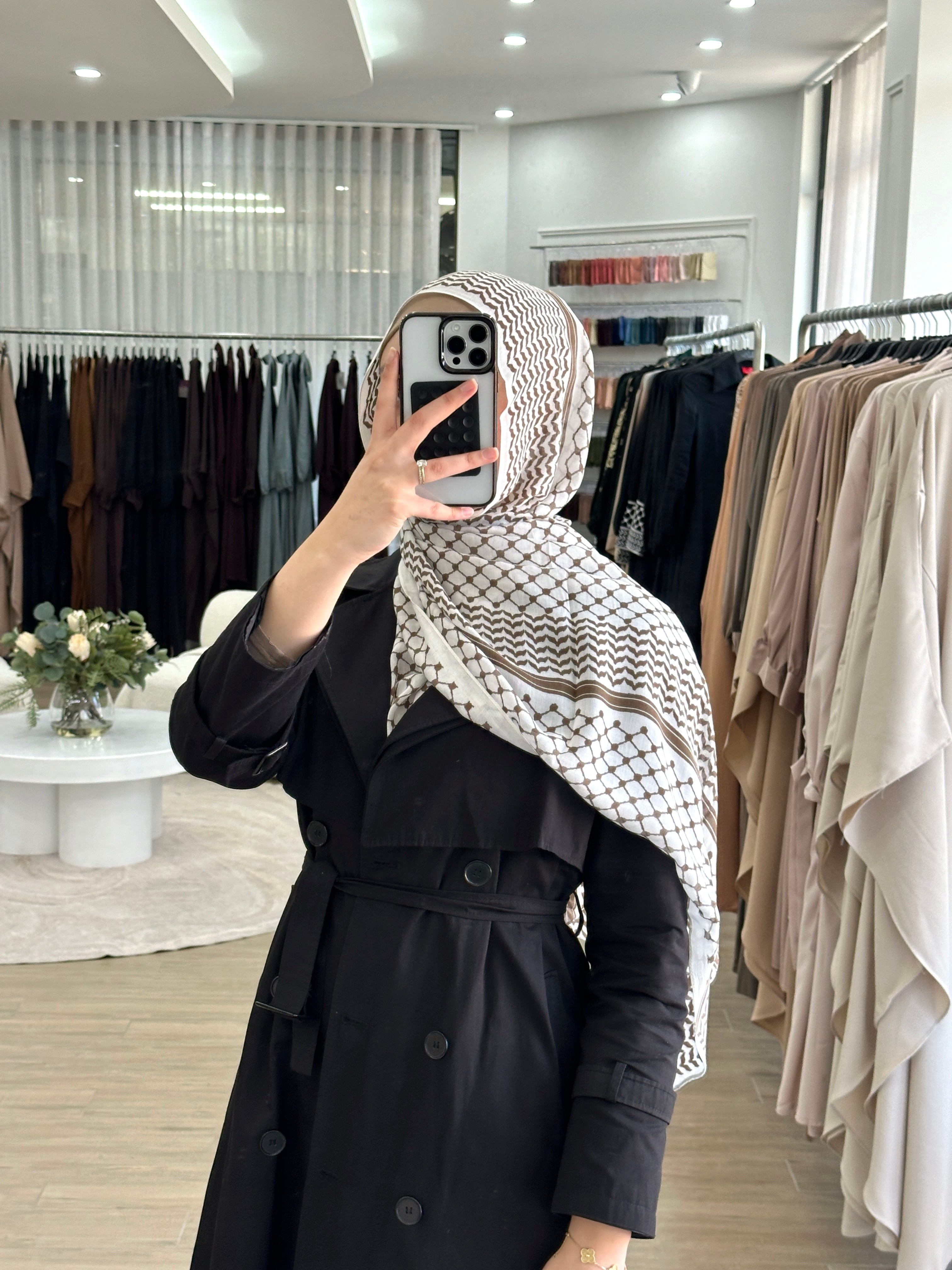 Modal Keffiyeh Print Hijab featuring a traditional keffiyeh-inspired pattern, measuring 180cm x 70cm. Soft, lightweight fabric with generous coverage. A portion of proceeds supports relief efforts in Palestine and Lebanon.