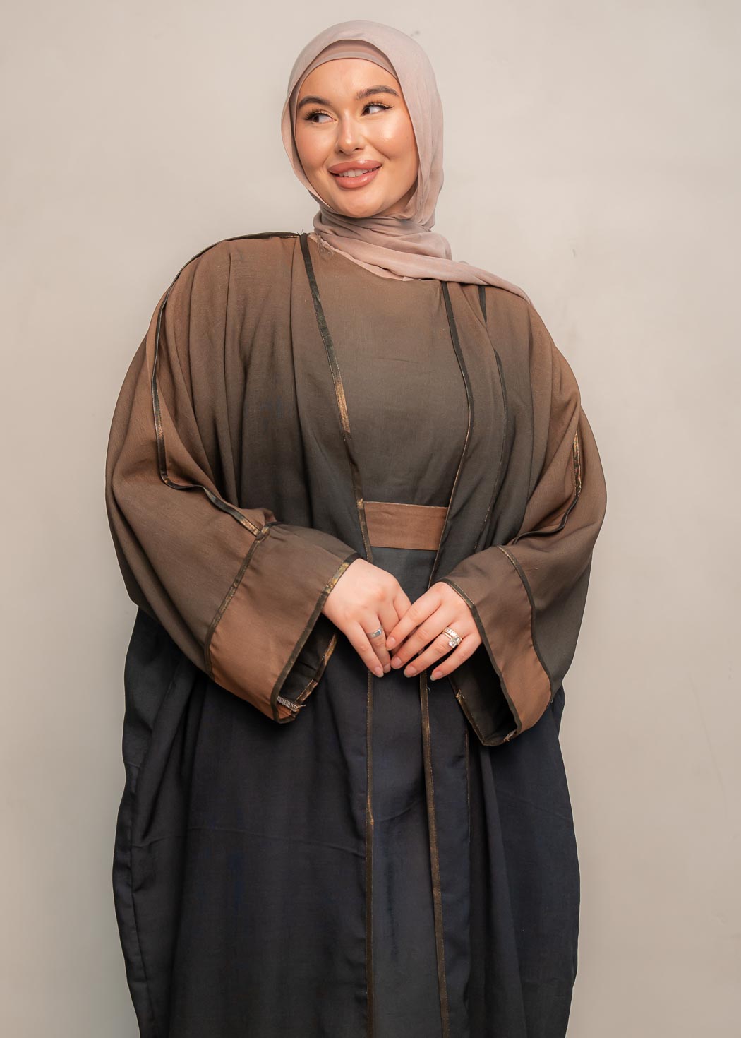  The stunning kaftan dress and tonal dress underlay provide versatility and comfort, while the lace tie neckline adds a feminine touch. Perfect for social occasions and functions, this set will be on high rotation in your wardrobe.