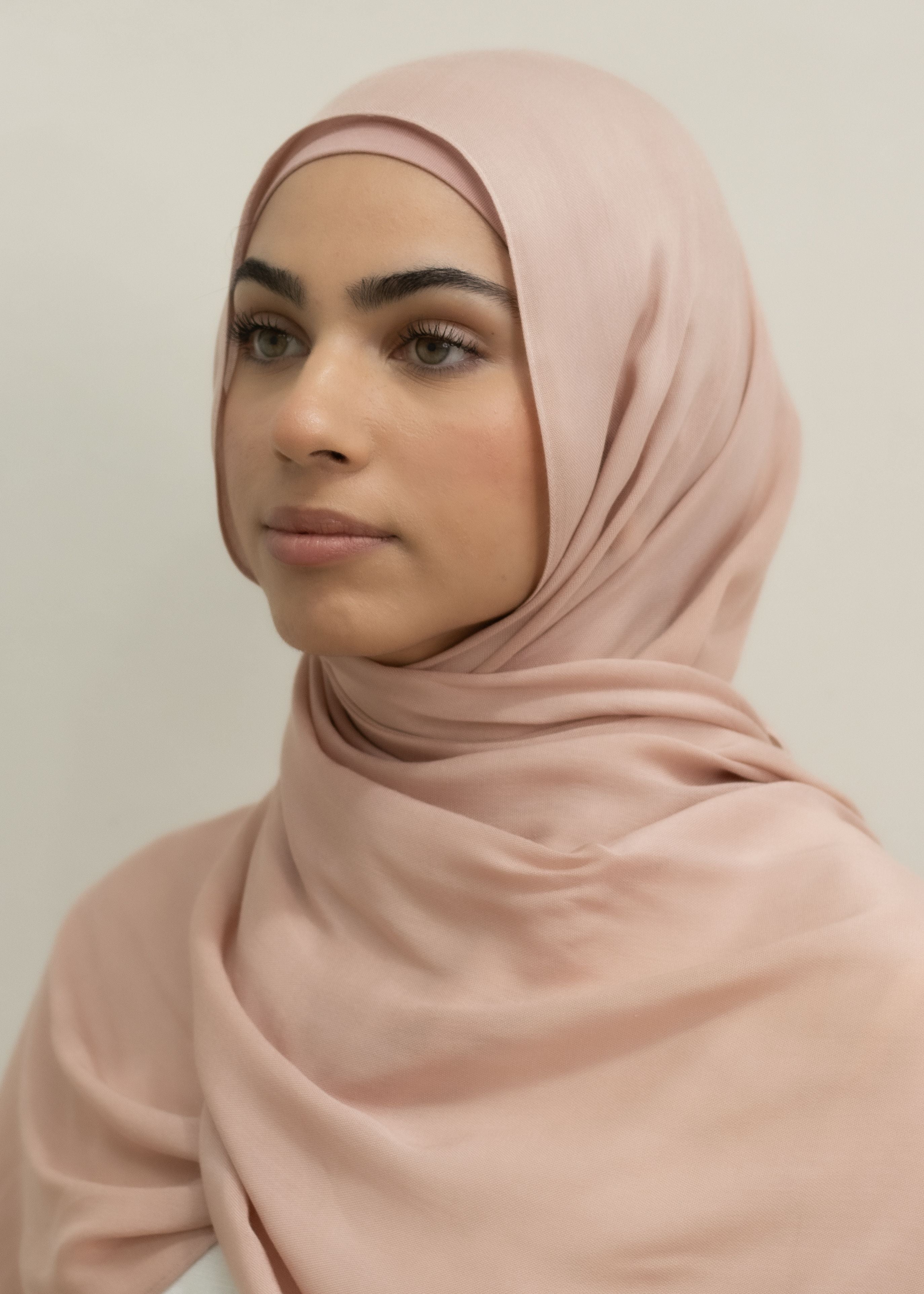 The material is designed to be almost non-see through, offering excellent coverage while maintaining a lightweight, breathable feel. Perfect for those seeking a blend of style, comfort and modesty.