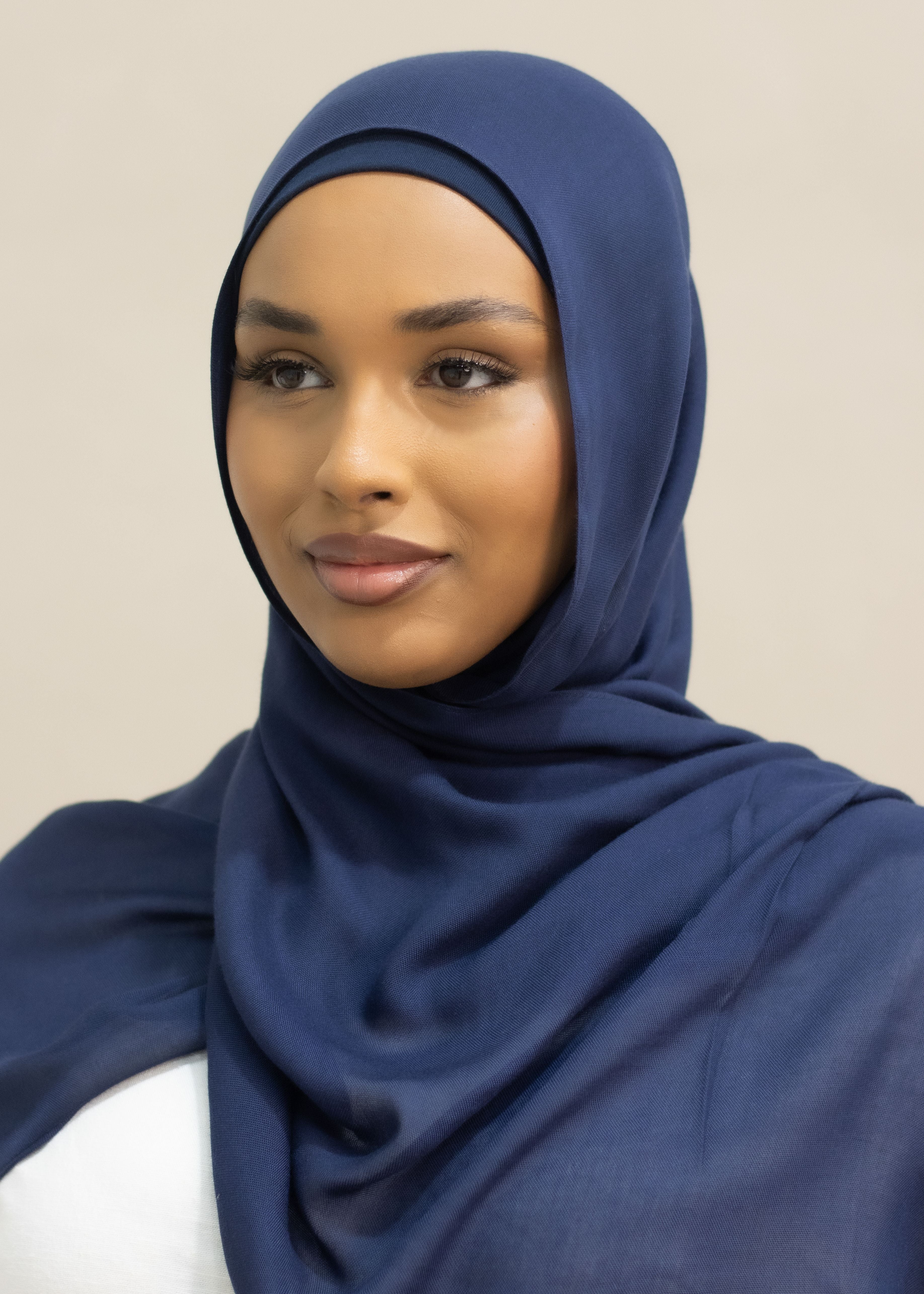 The material is designed to be almost non-see through, offering excellent coverage while maintaining a lightweight, breathable feel. Perfect for those seeking a blend of style, comfort and modesty.
