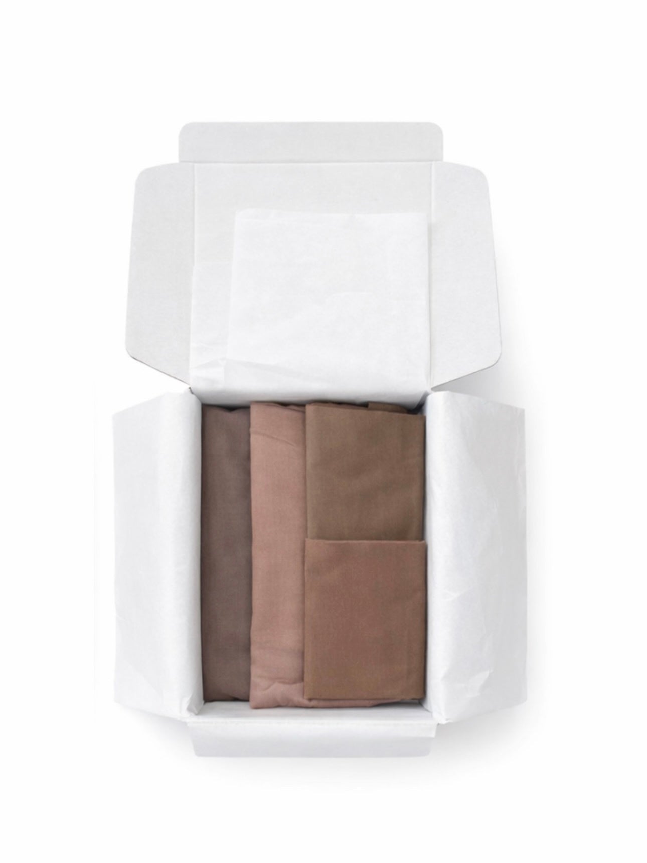 Hijab Gift Box containing 2 long Modal hijabs in Ash Rose and Fawn shades, paired with 2 caps. A thoughtful gift for Eid, Mother's Day, or someone new to wearing the hijab