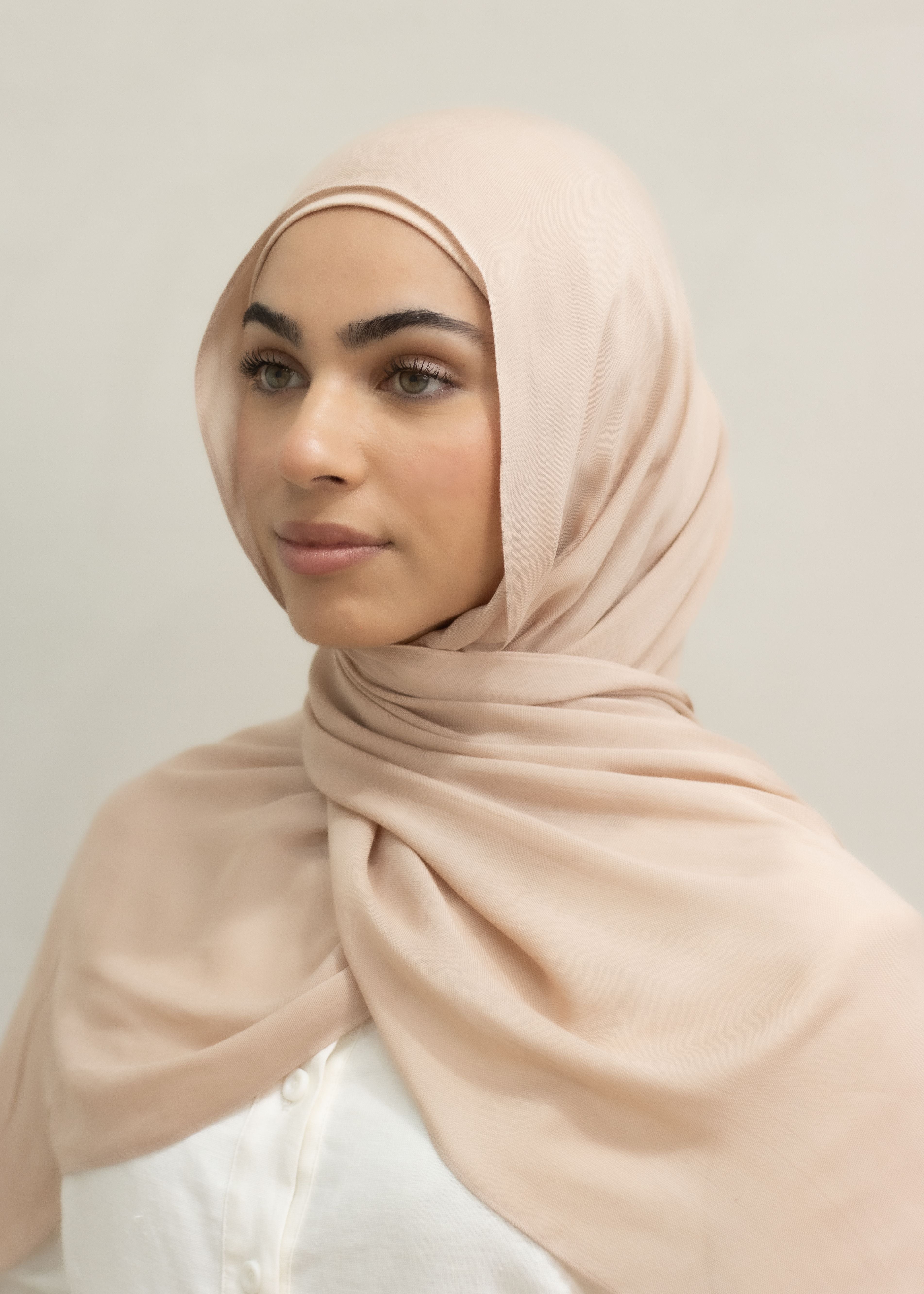 Modal Hijab & Cotton Cap Set featuring a soft, lightweight modal hijab with an elegant drape and near opaque coverage, paired with a comfortable cotton undercap for secure, breathable all-day wear.