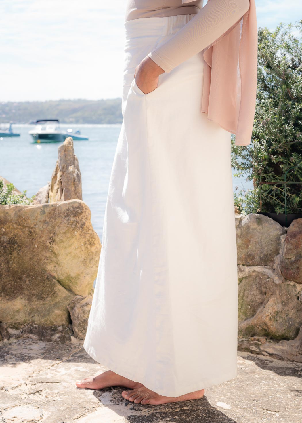 Two-piece set featuring a maxi-length duster coat and elastic-waist wide-leg skirt, designed in a relaxed, throw-on style for comfortable, effortless wear across seasons.