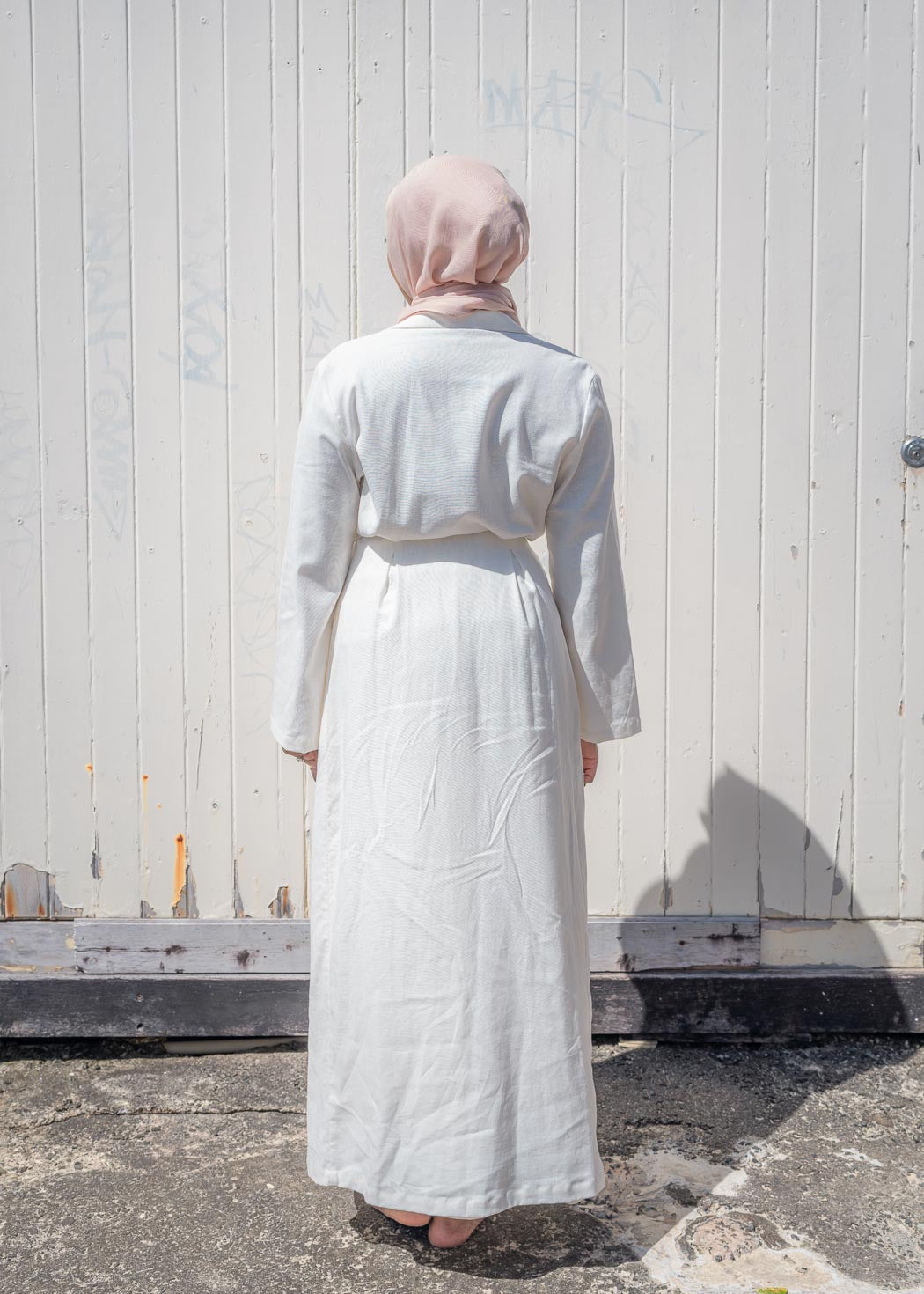 Two-piece set featuring a maxi-length duster coat and elastic-waist wide-leg skirt, designed in a relaxed, throw-on style for comfortable, effortless wear across seasons.
